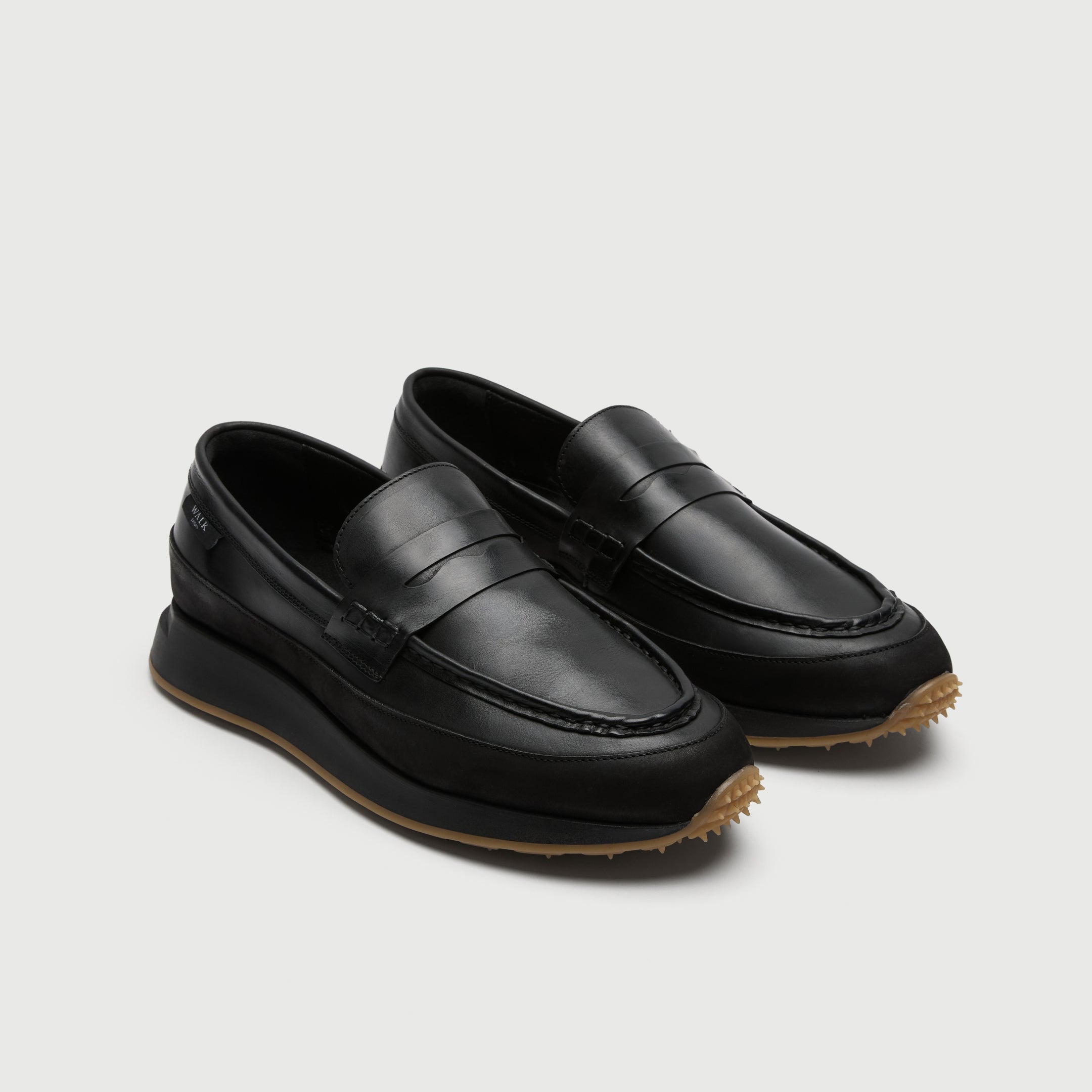 Walk London Battersea Saddle Hybrid Loafer in black leather three quarter view