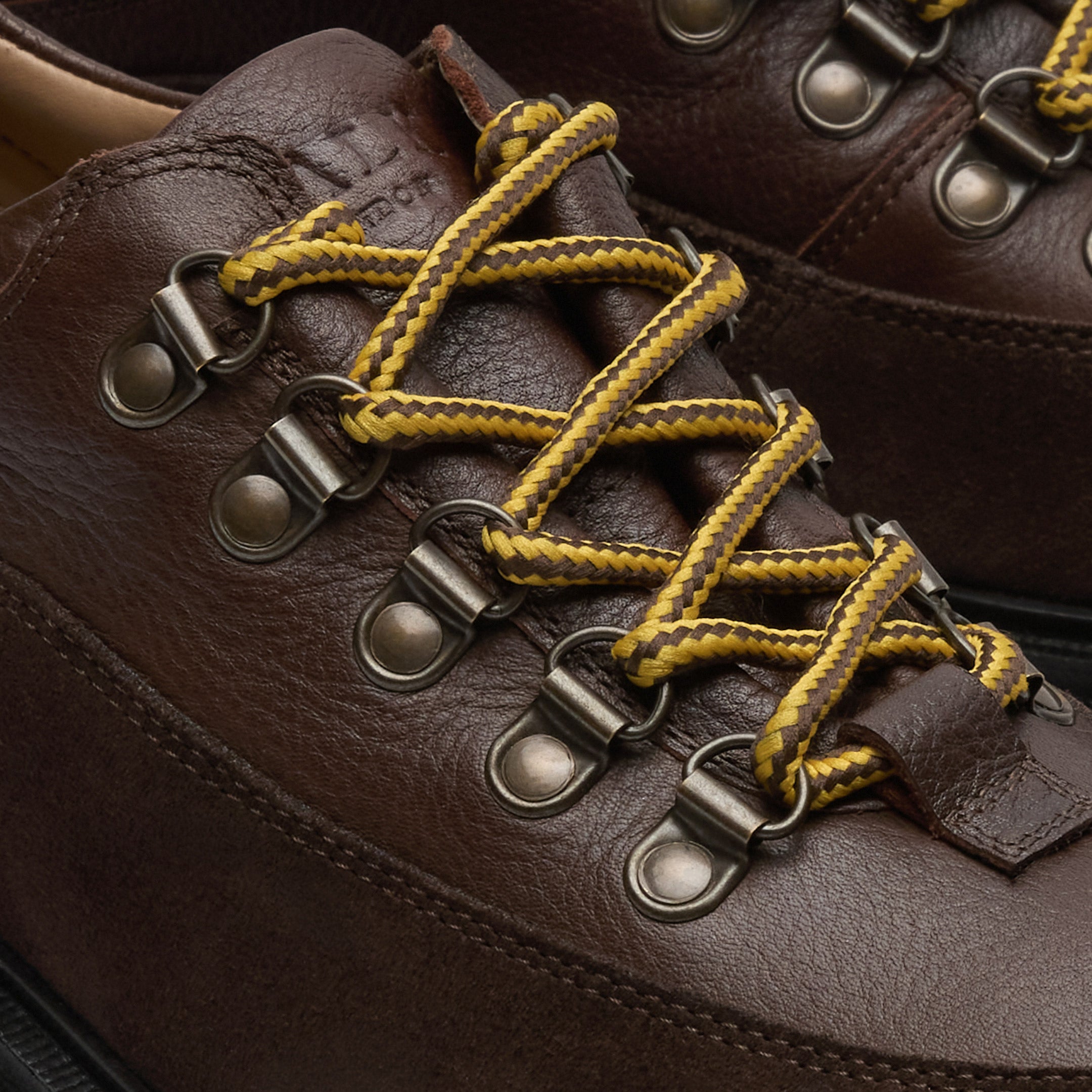 Walk London Bethnal Hiking Shoes in brown leather and suede close up view of yellow and brown laces and D-rings