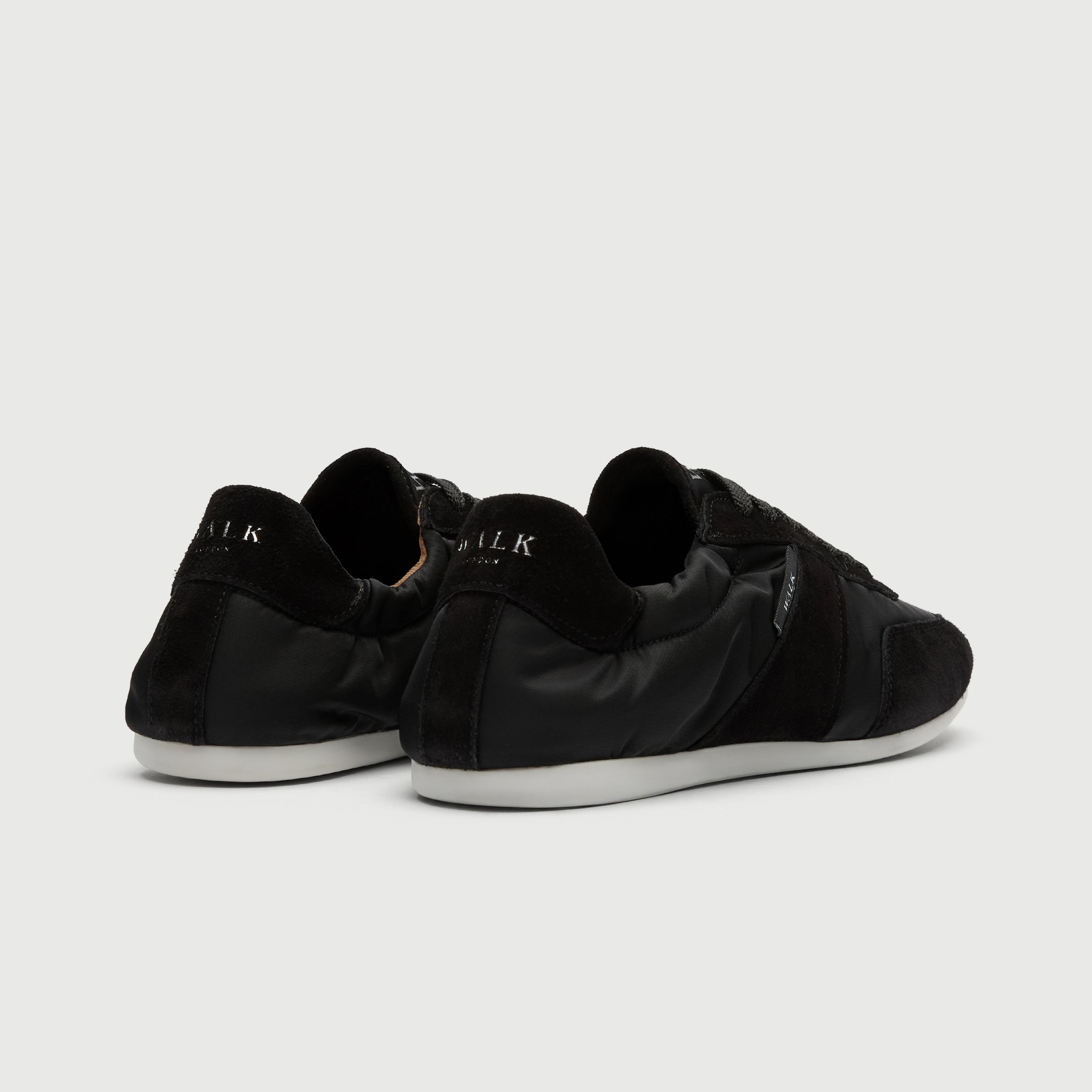 Walk London Firenze Trainer in black suede and textile heel view