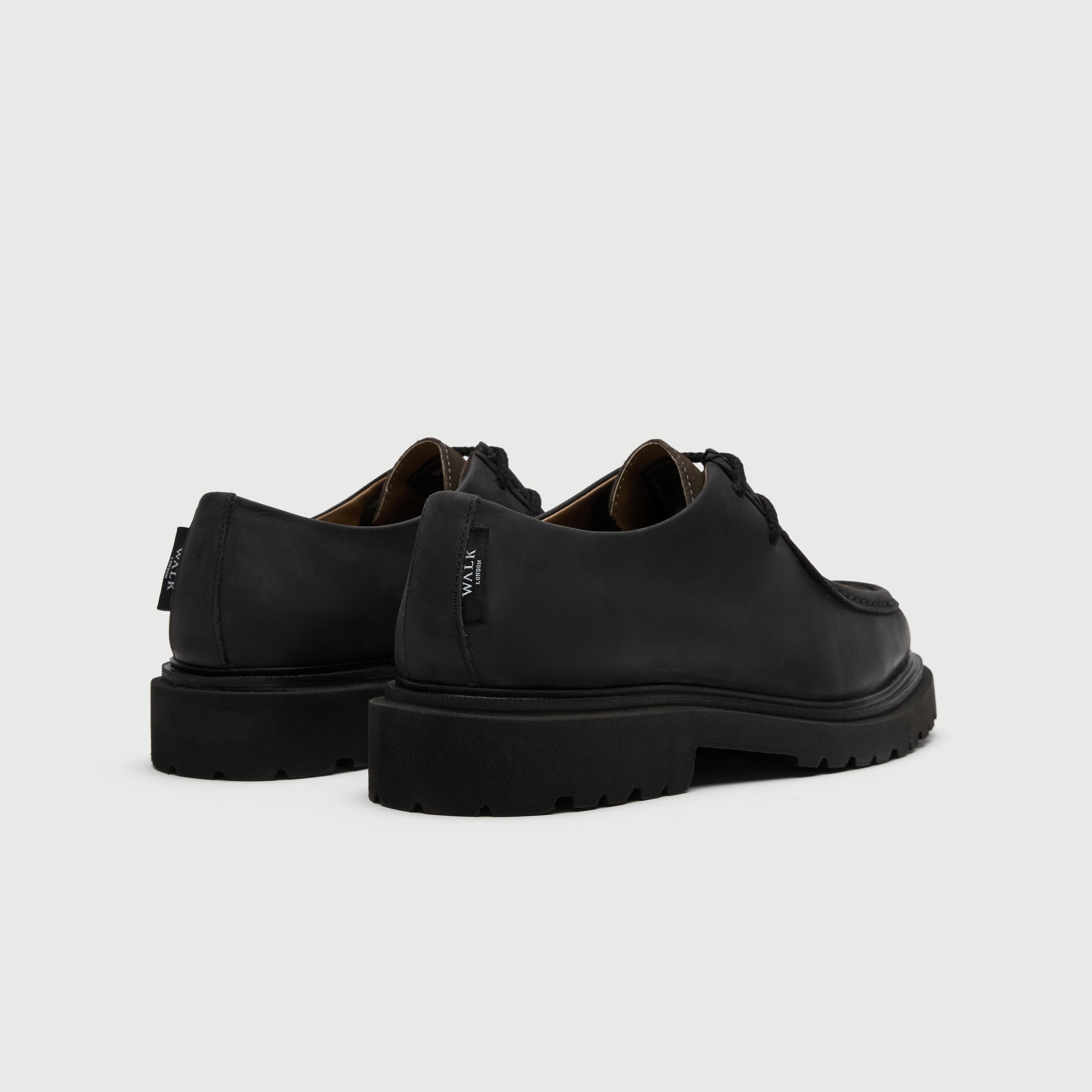 Walk London Hackney Apron Shoes in dark grey leather heel view with branded label