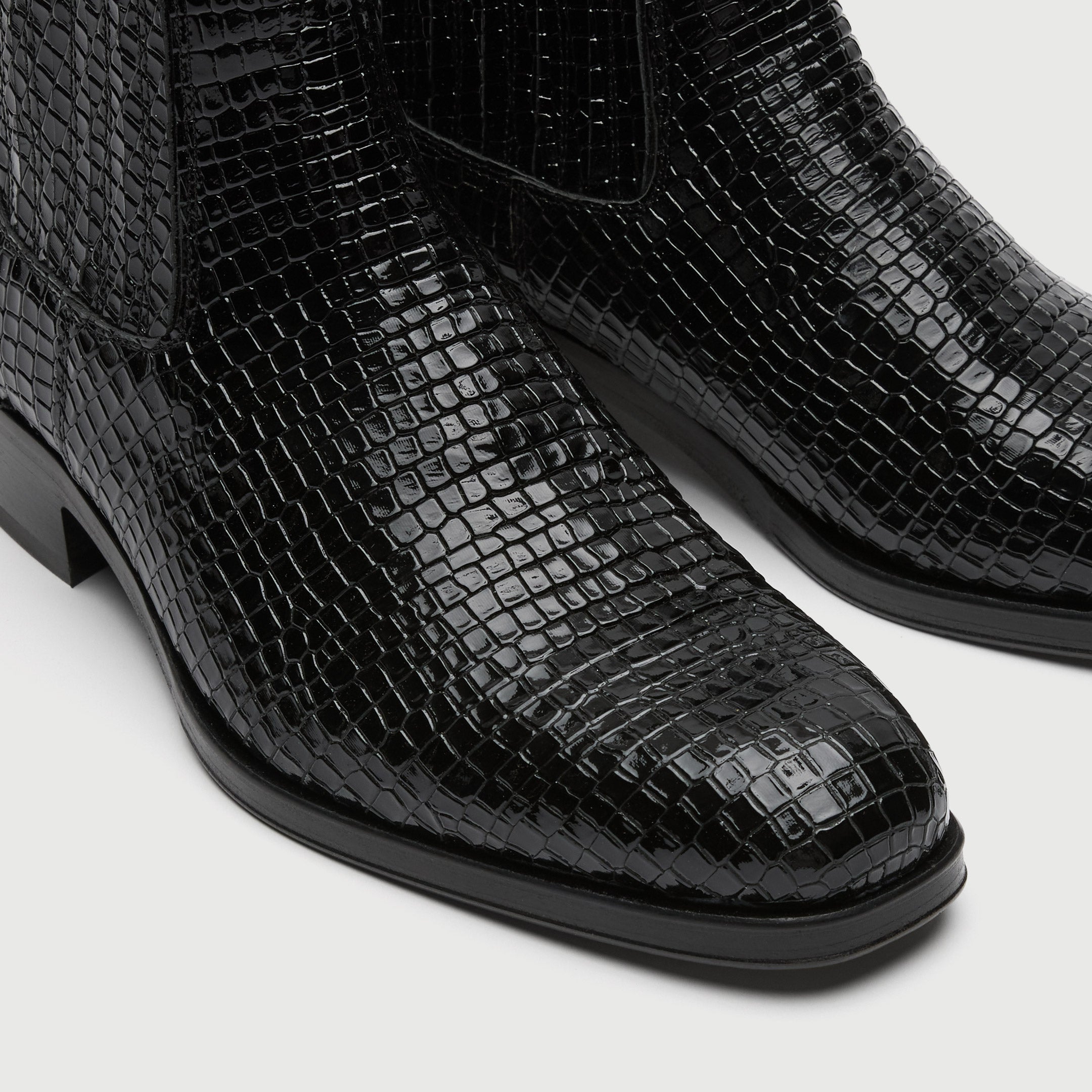 Walk London Lennon Cuban Black textured ankle boot on a light grey background