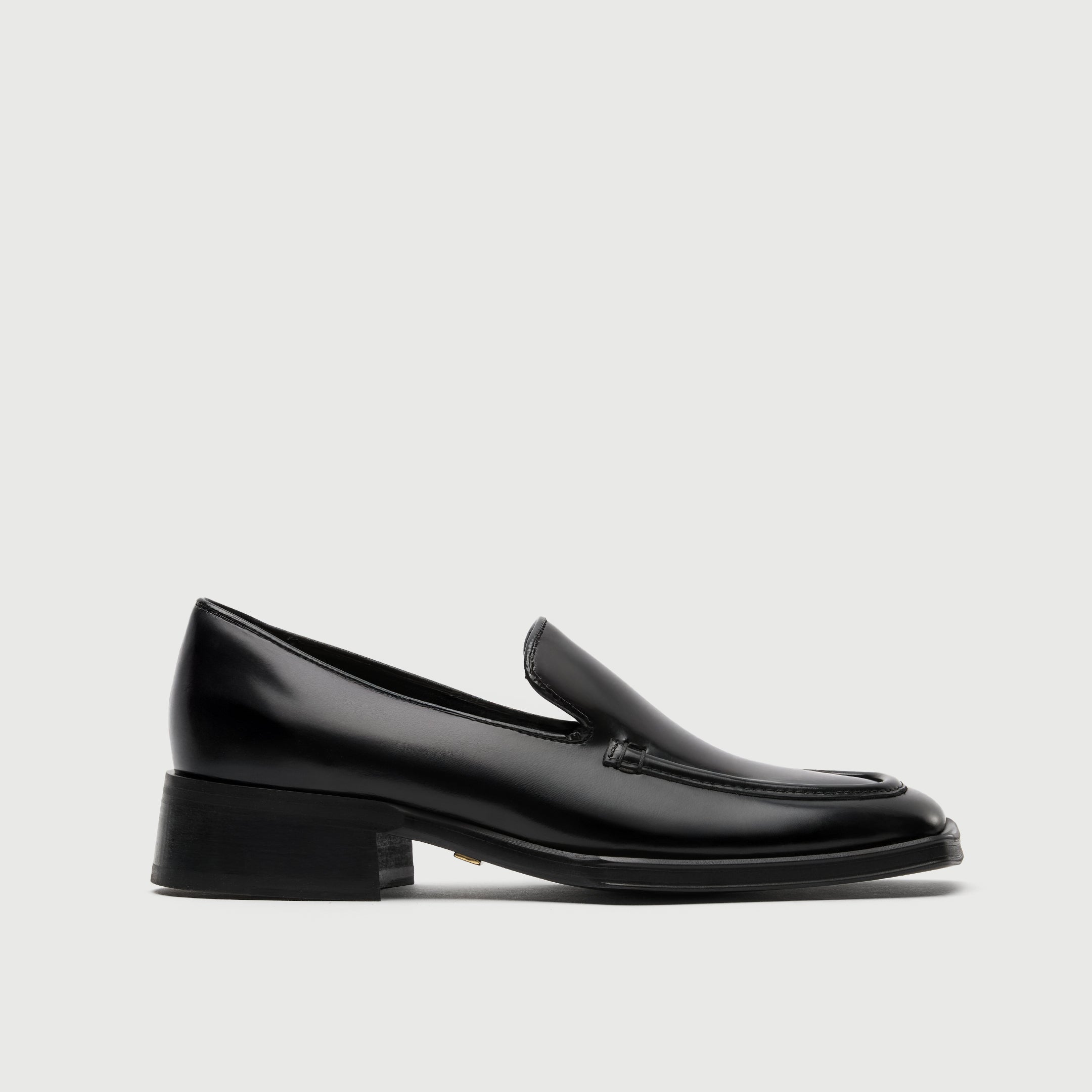 Black leather loafer with a light grey background - Walk London Abbey Loafer