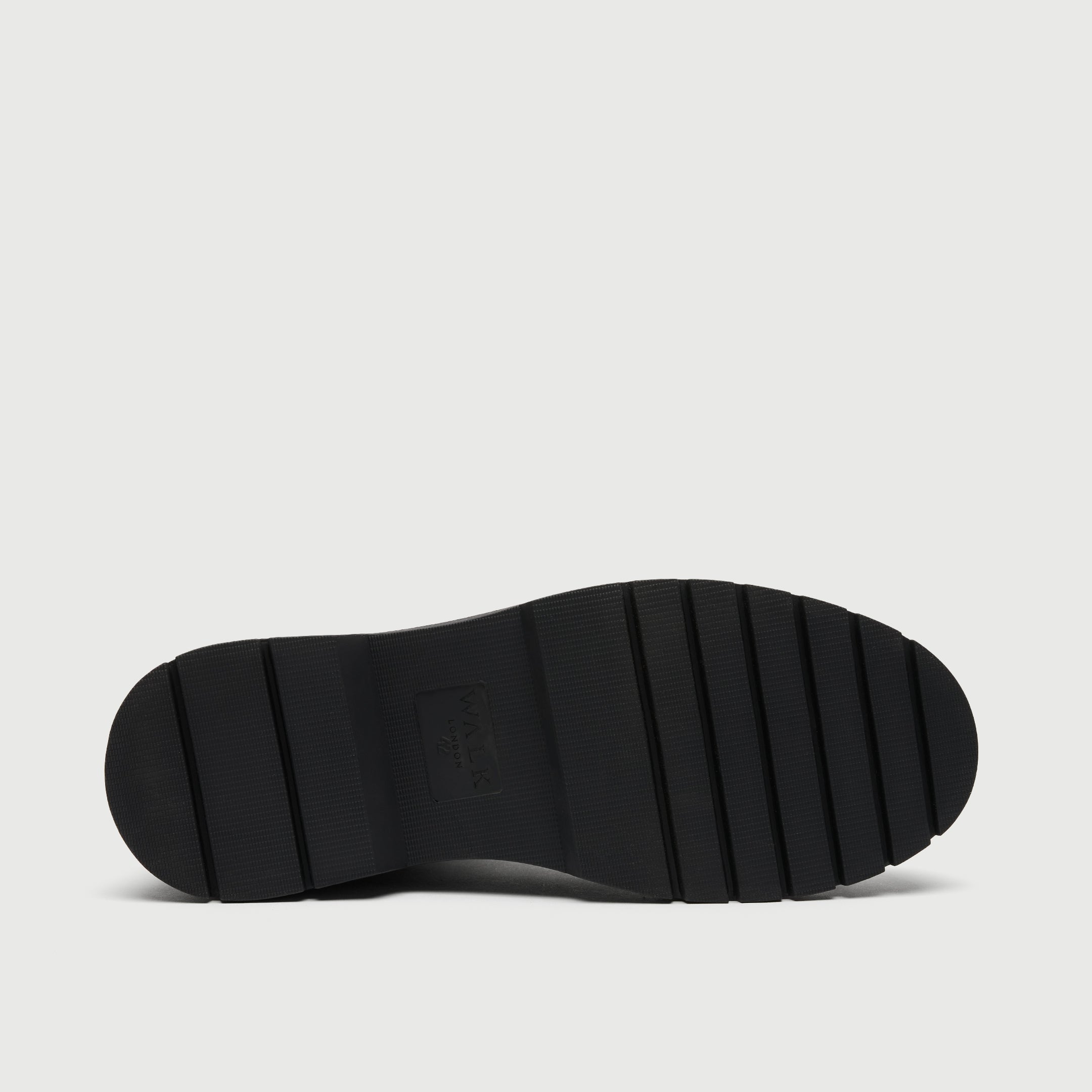 Dark brown leather Chelsea boot on a light grey background - Walk London Callum Seam Chelsea Boot Sole View