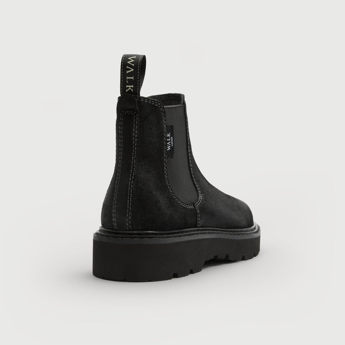 Walk London Clapham Chelsea Boot in black suede heel view showing branded pull tab and stitching detail