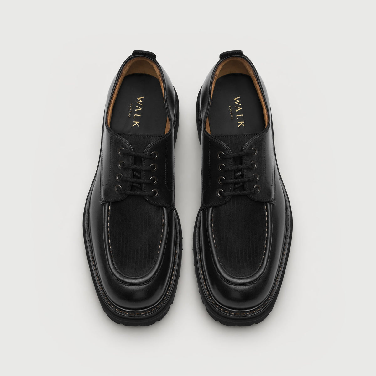 Walk London Farringdon Apron Shoe in black leather top view showing cord vamp, laces, tan lining, black insole with gold branding