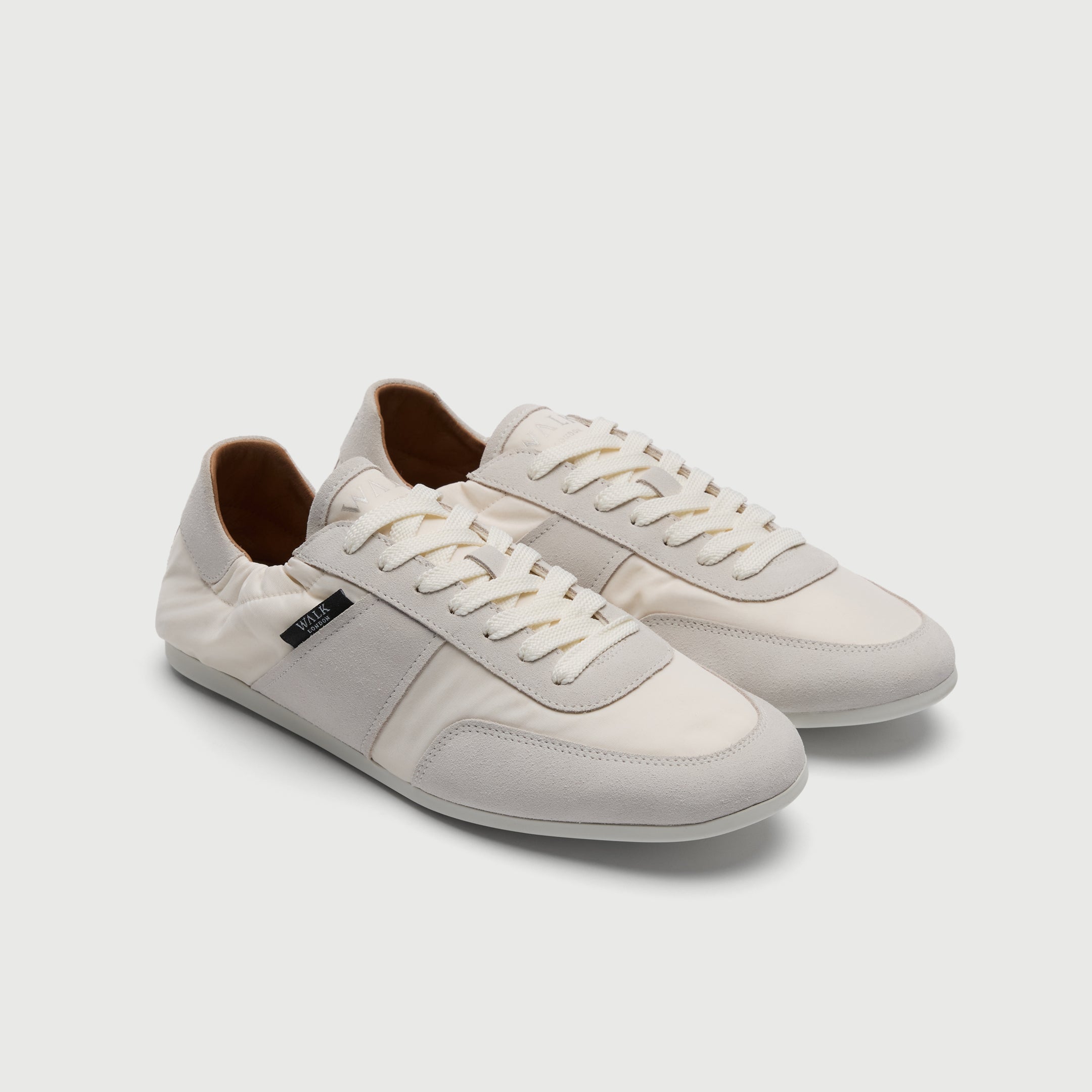 Walk London Firenze Trainer in white suede and textile three quarter view