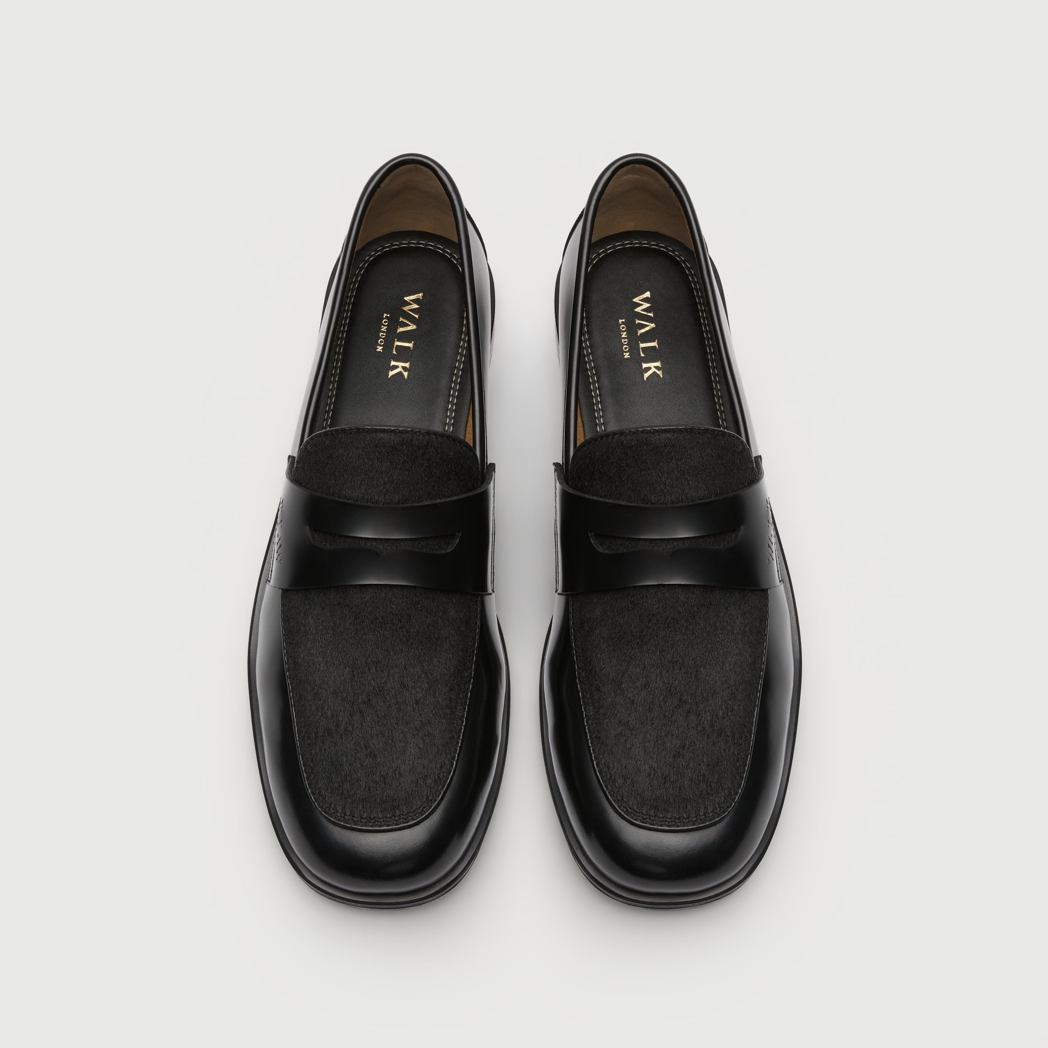 Walk London Grosvenor Saddle Loafers in Black Leather with black pony hair vamp top view showing black insole with gold branding and stitch detail