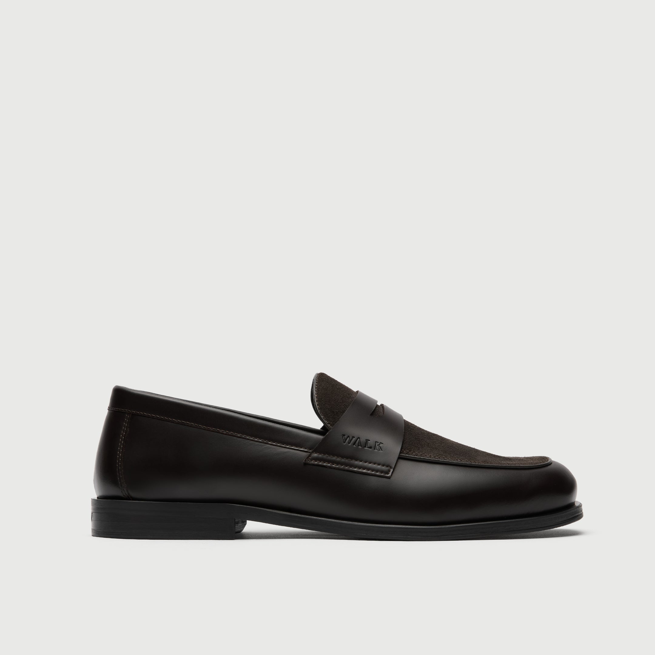 Walk London Grosvenor Saddle Loafer in Dark Brown Leather and Suede side view showing suede vamp and debossed branding on the side of the saddle strap