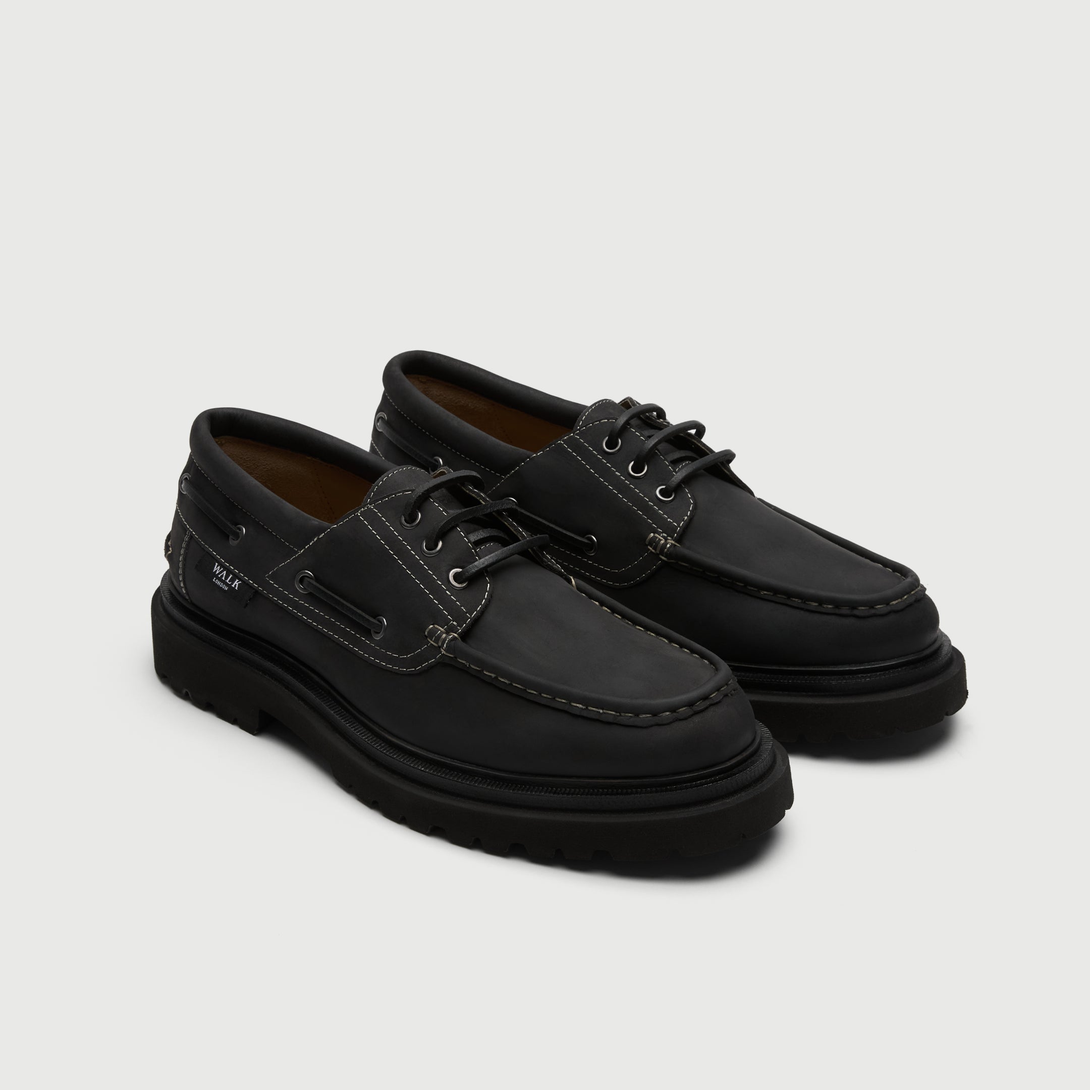 Walk London Hackney Boat Shoes in matte charcoal black leather with contrast stitch three quarter view