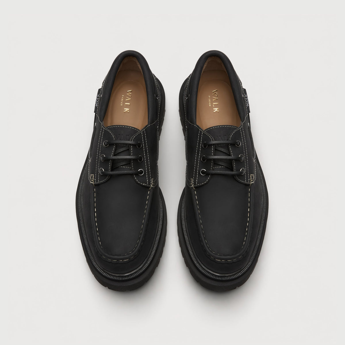 Walk London Hackney Boat Shoes in matte charcoal black leather with contrast stitch top view showing tan insole with gold branding