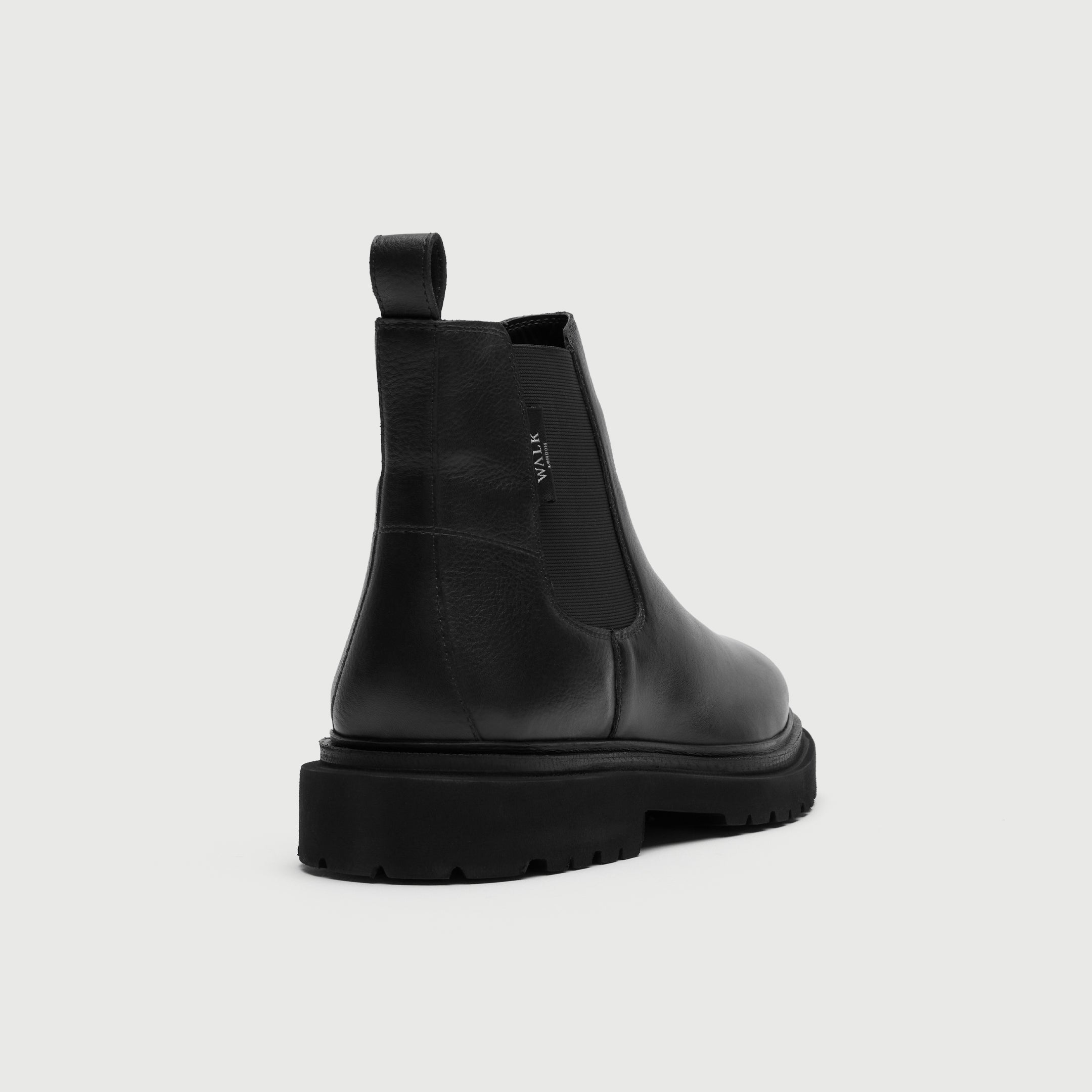 Walk London Hackney Chelsea Boot in Black Leather heel view showing pull tab and branded label