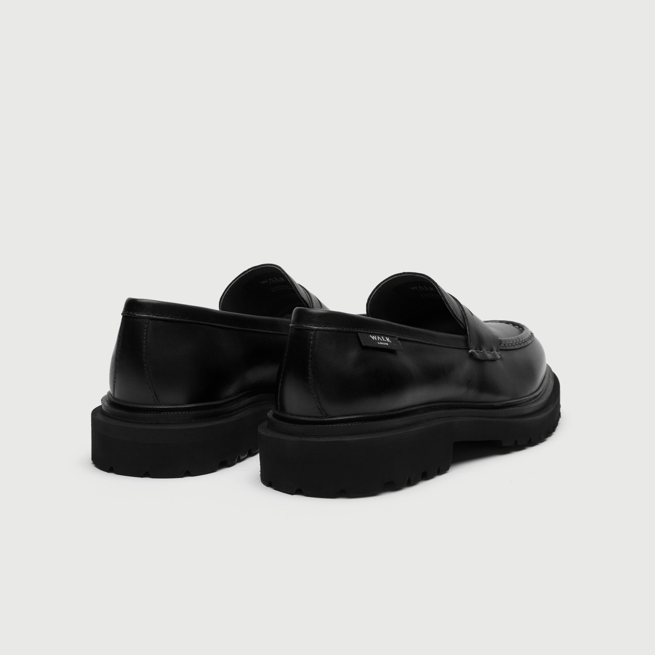 Walk London Hackney Saddle Loafer in Black Leather heel view showing branded label