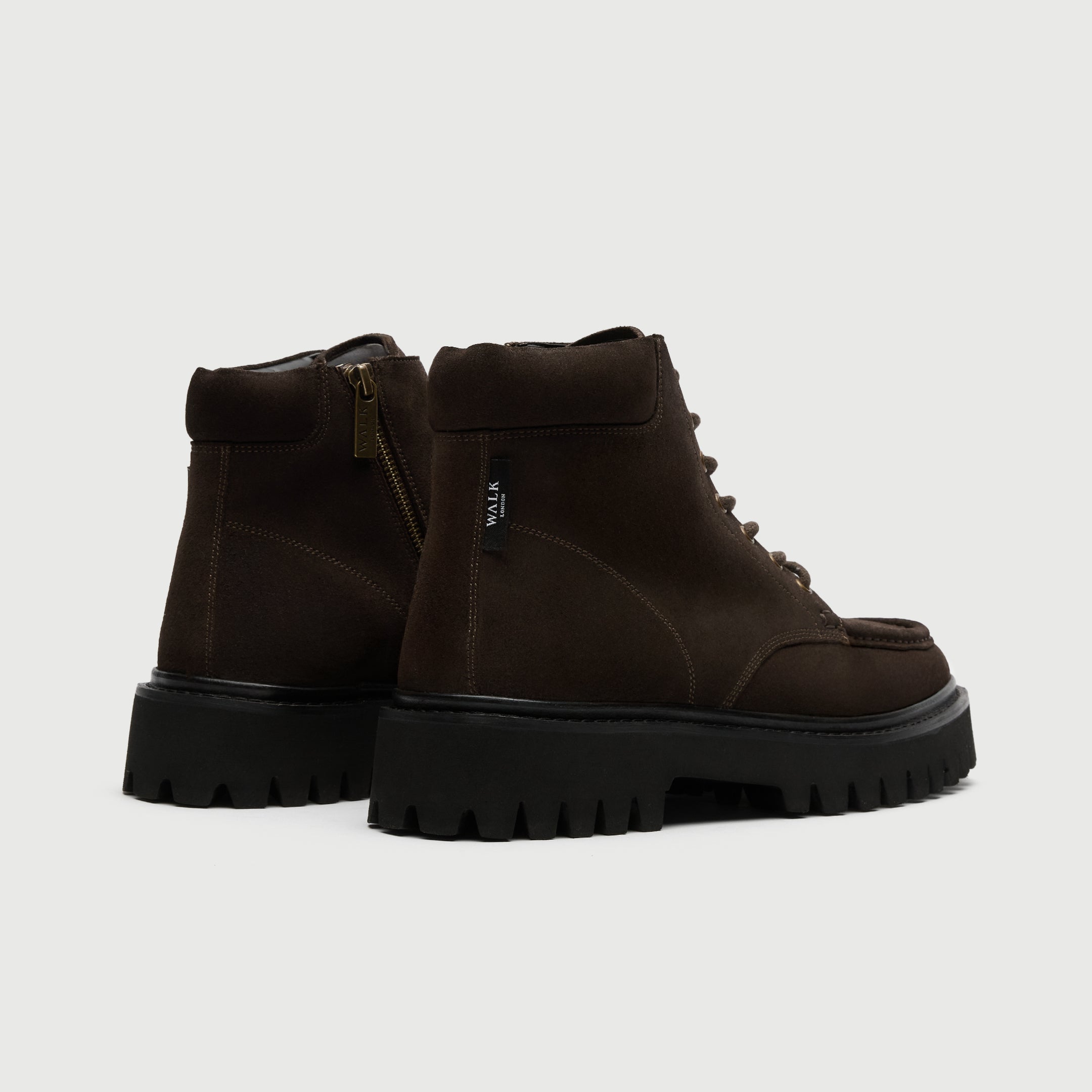 Brown suede Hopper apron boot from Walk London Shoes with thick sole on a light grey background