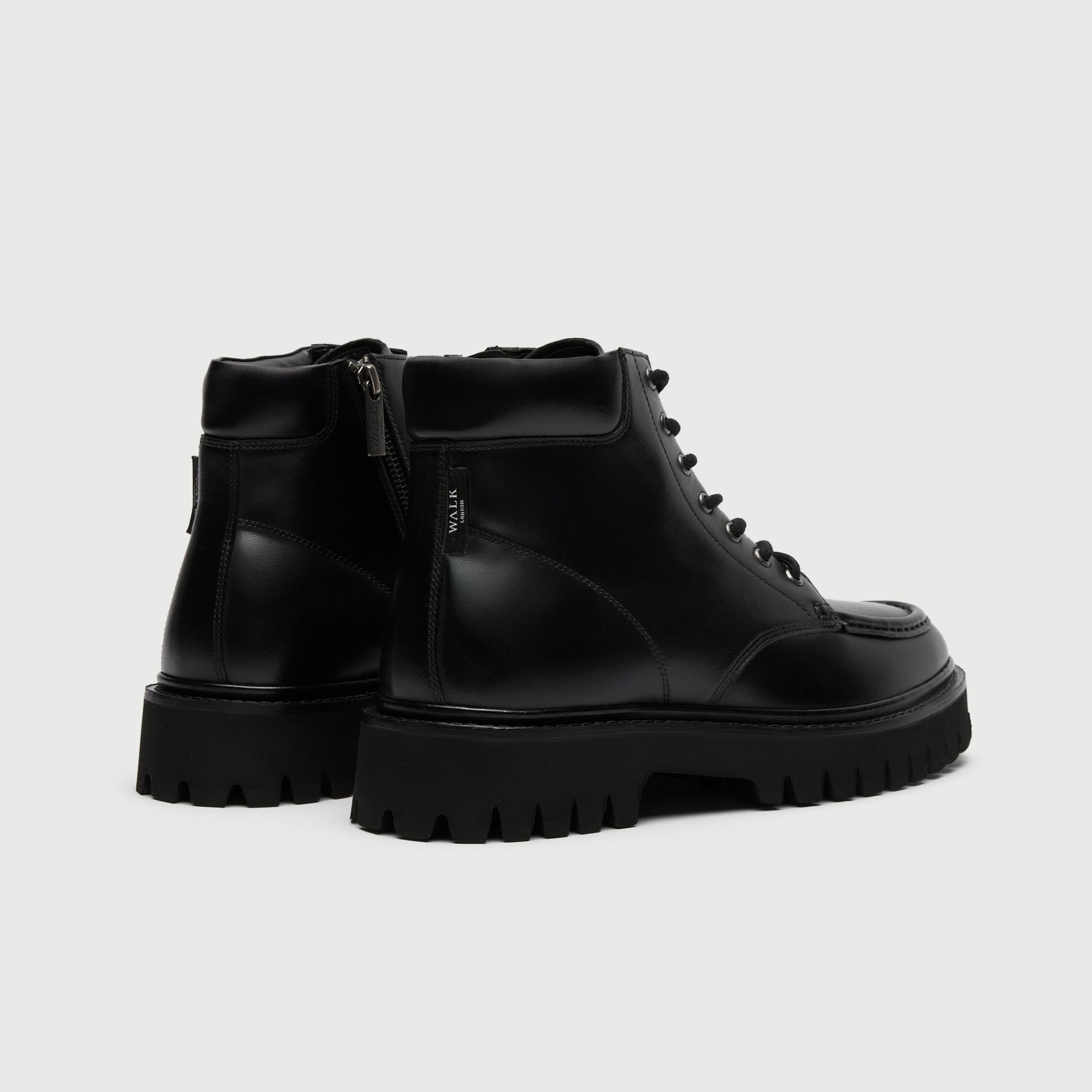 Walk London - Back view of a Hopper Apron boot on a light Gray background