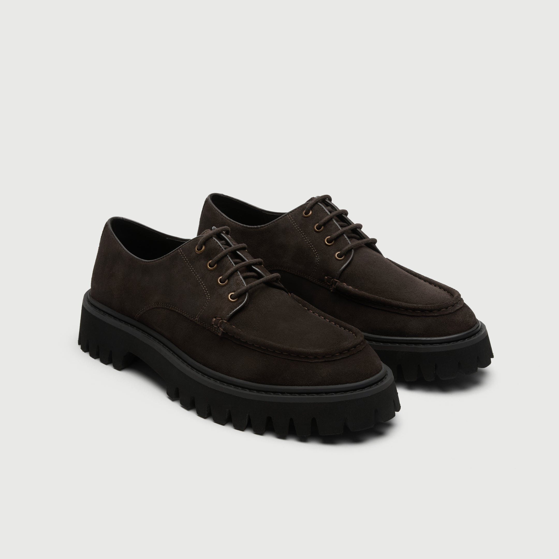Walk London Hopper Lace Shoes in Brown Suede three quarter view showing brass toned eyelets, brown laces, apron stitch detailing, and chunky black sole
