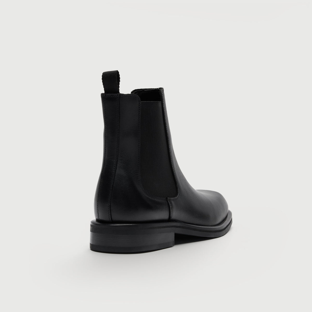 Walk London Lambeth Chelsea Boot in Black Leather heel view showing the pull tab and elastic side panel
