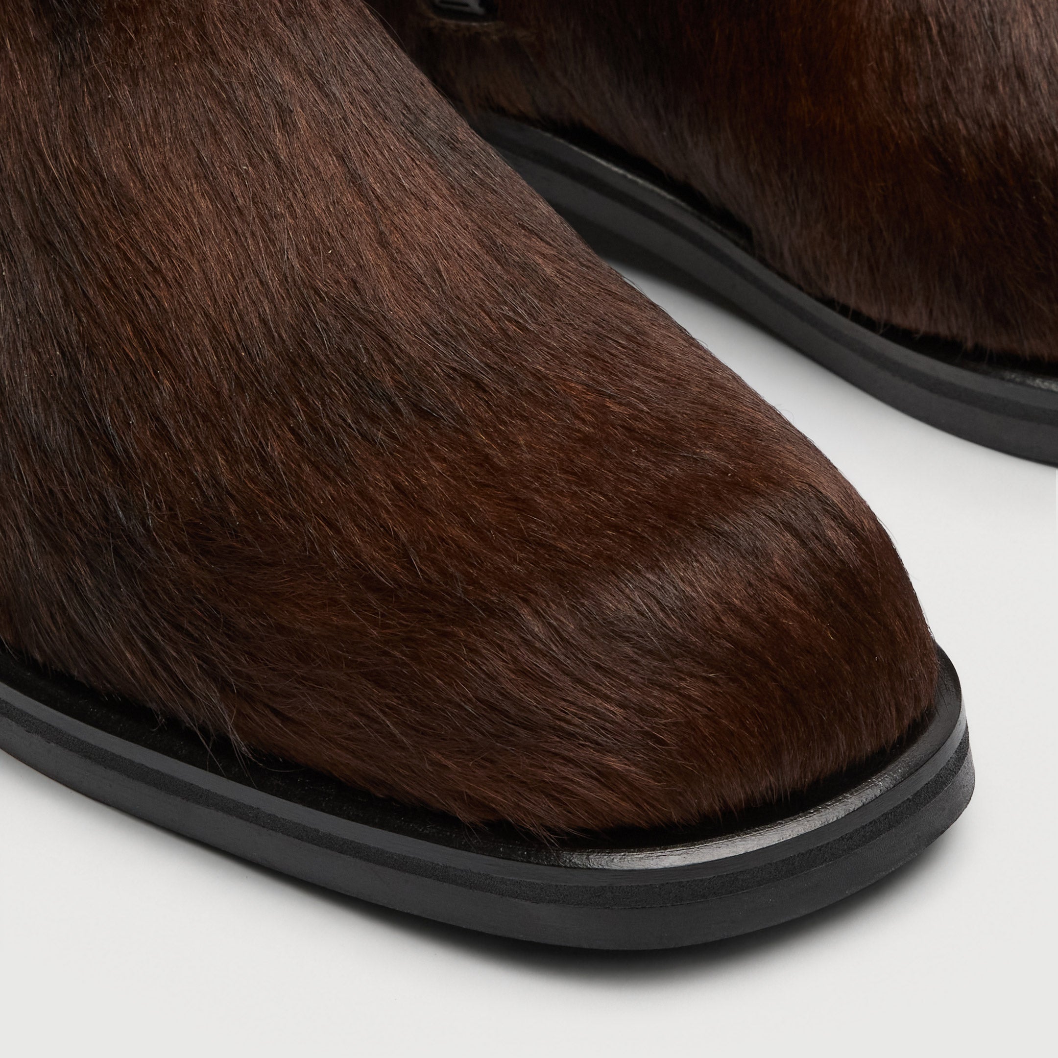 Walk London Lambeth Inside Zip Boot in Brown Pony Hair close up of subtly squared toe and variation in hair colour