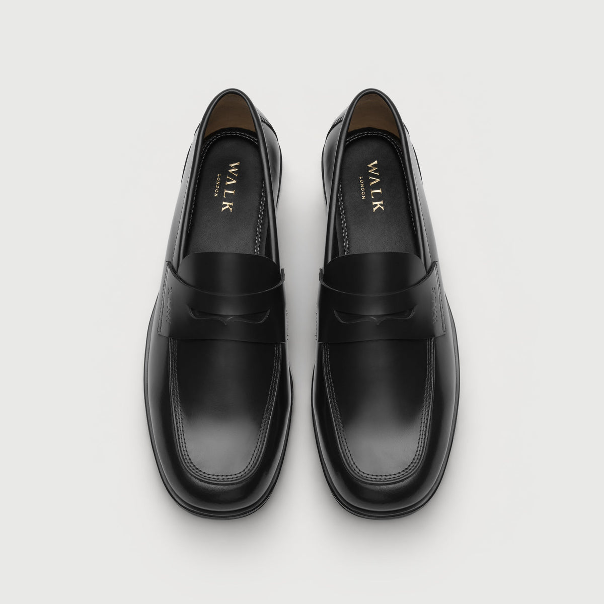 Walk London Marylebone Saddle Loafers in Black Leather top view showing gold foil branding on black insole