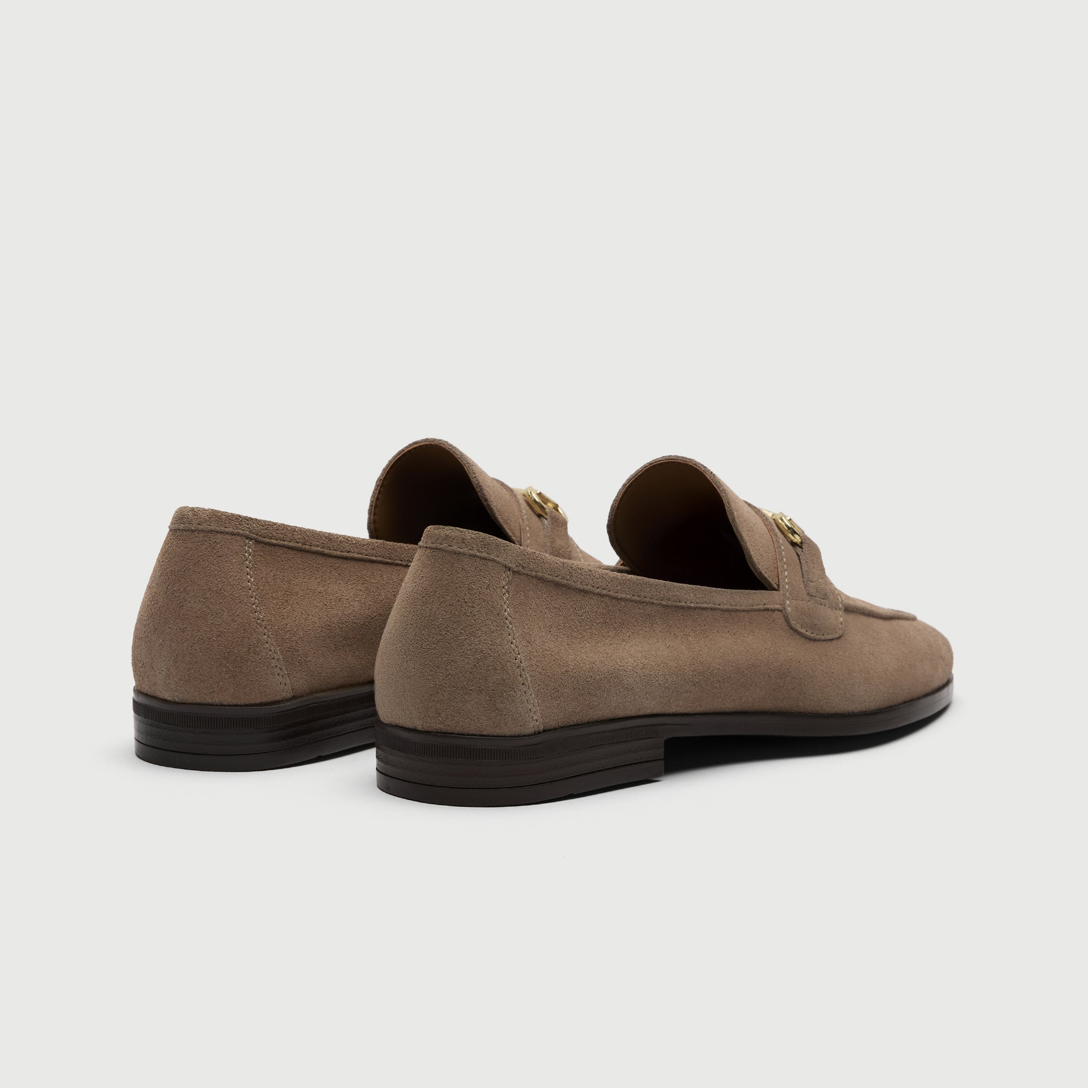 Walk London Naples beige loafer with gold trim heel view