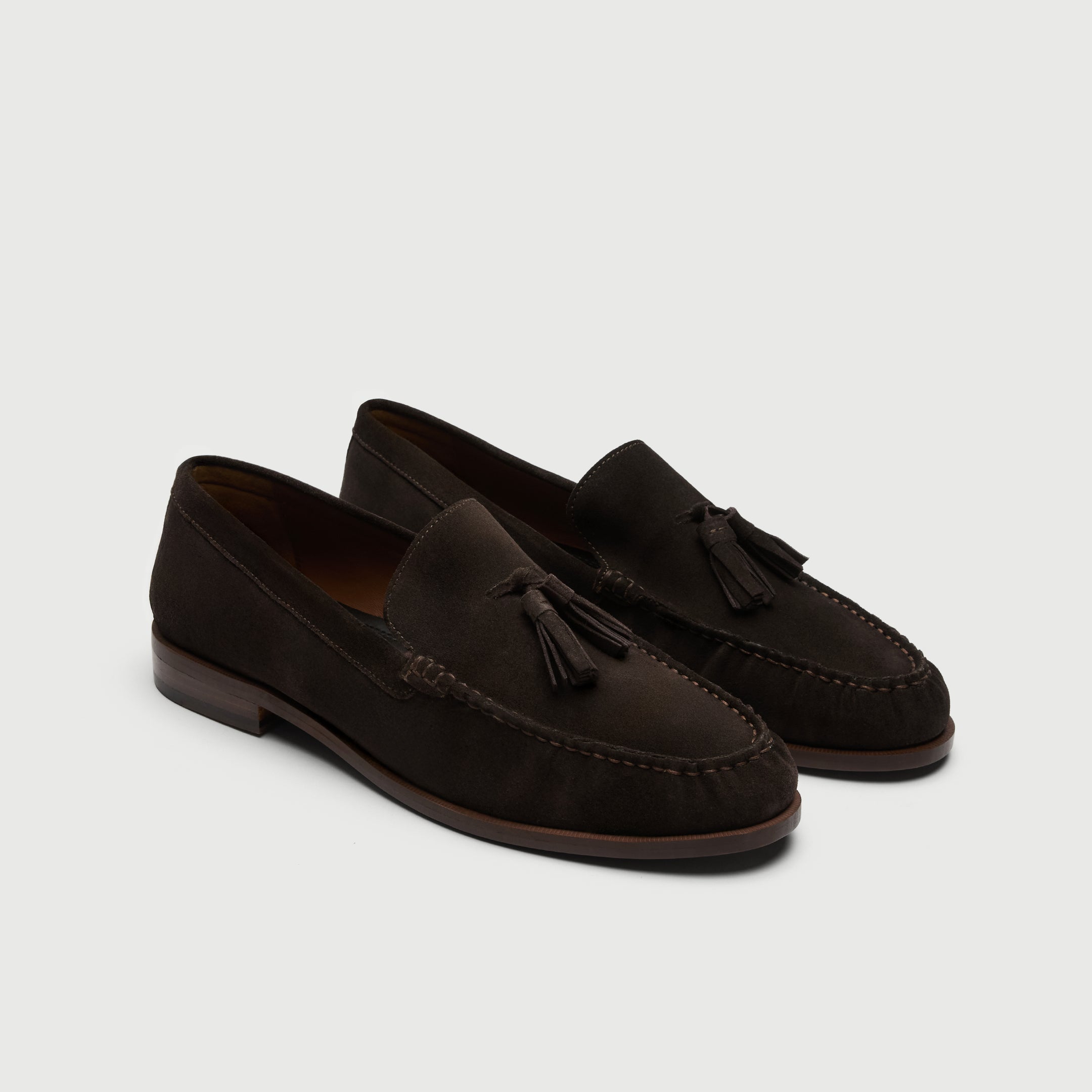 Video of man wearing Walk London Como Brown Suede Tassel Loafers with cream trousers