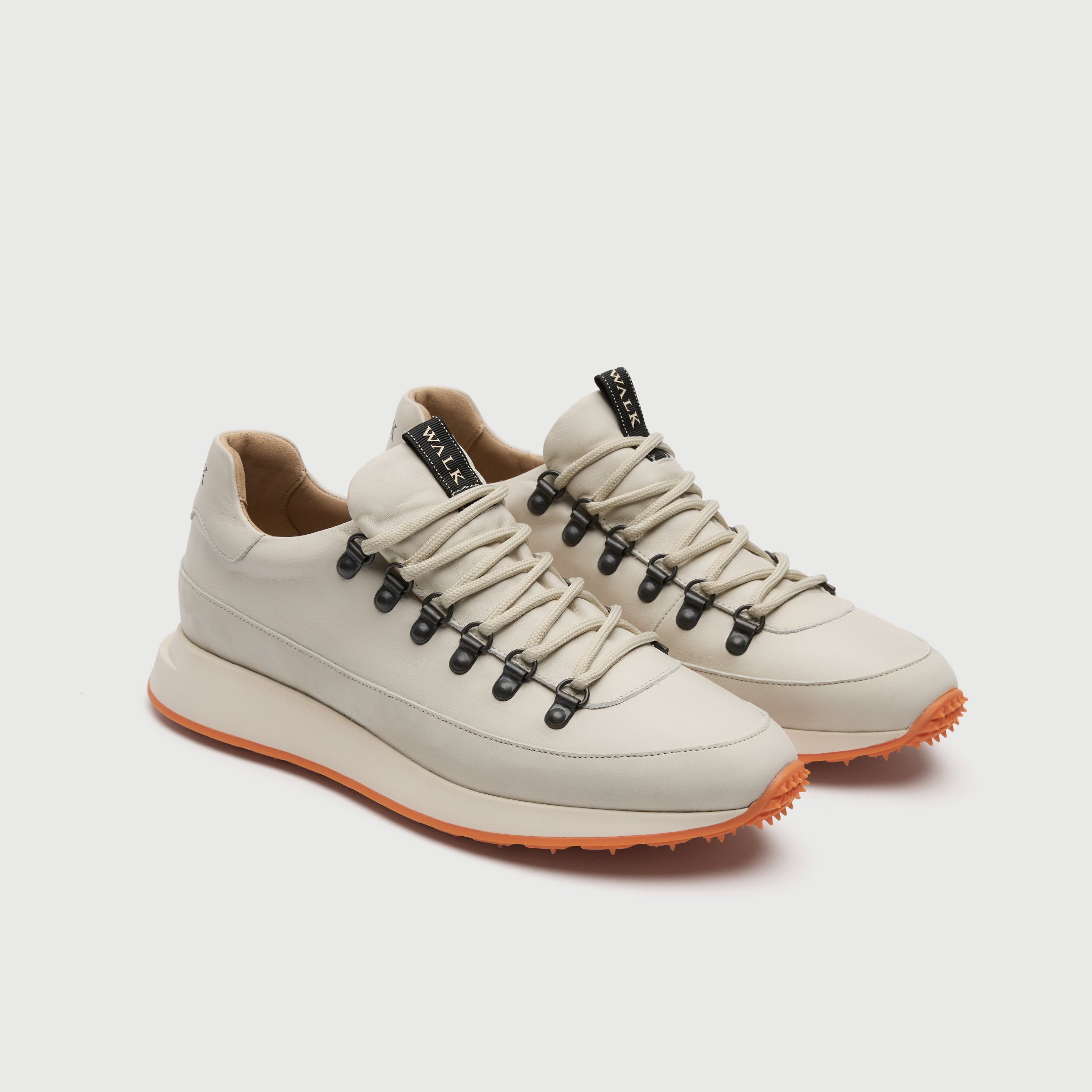 Walk London Hampstead Hiking Trainer with an orange sole on a light grey background