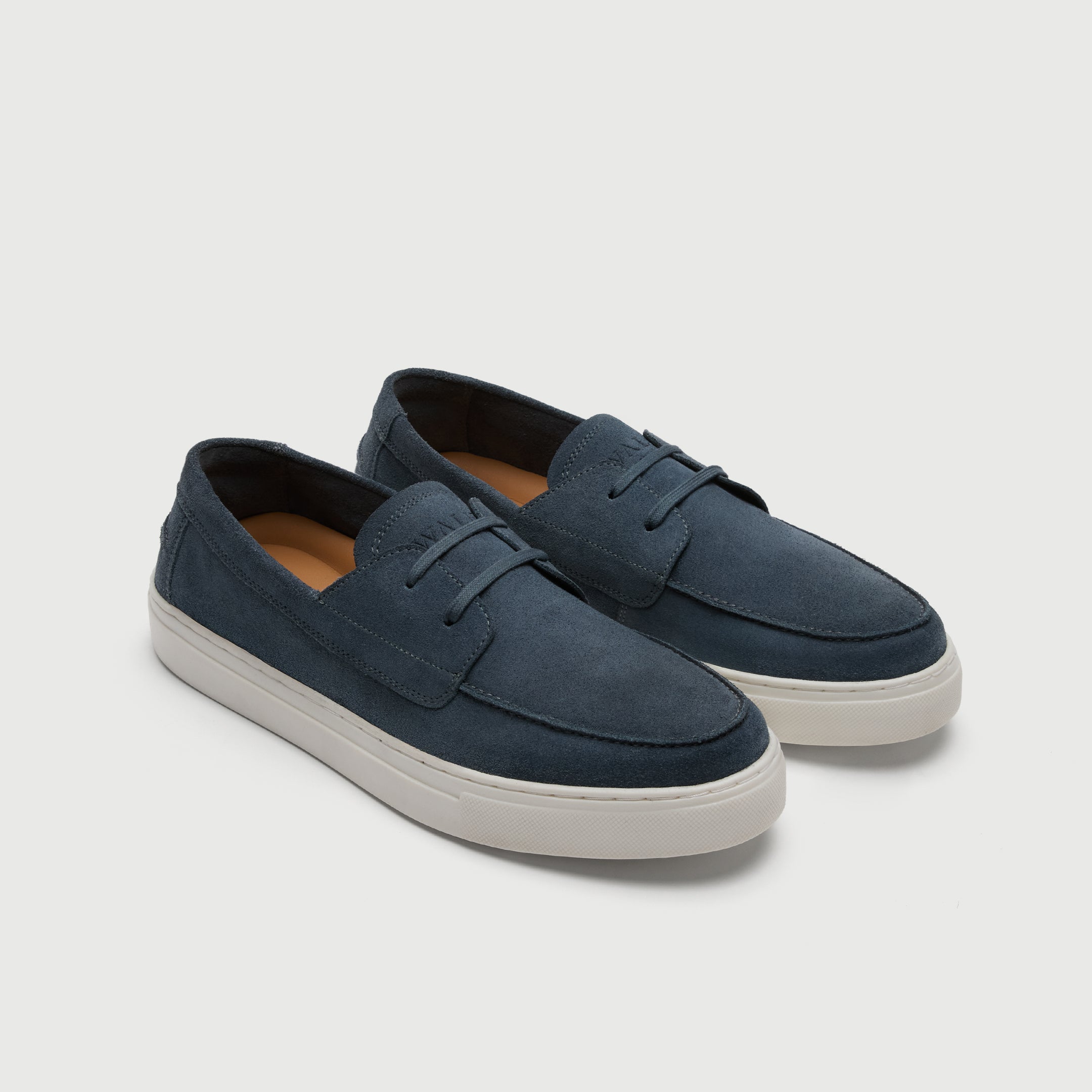 Video of man wearing Walk London Sicily blue suede boat shoes with cream trousers