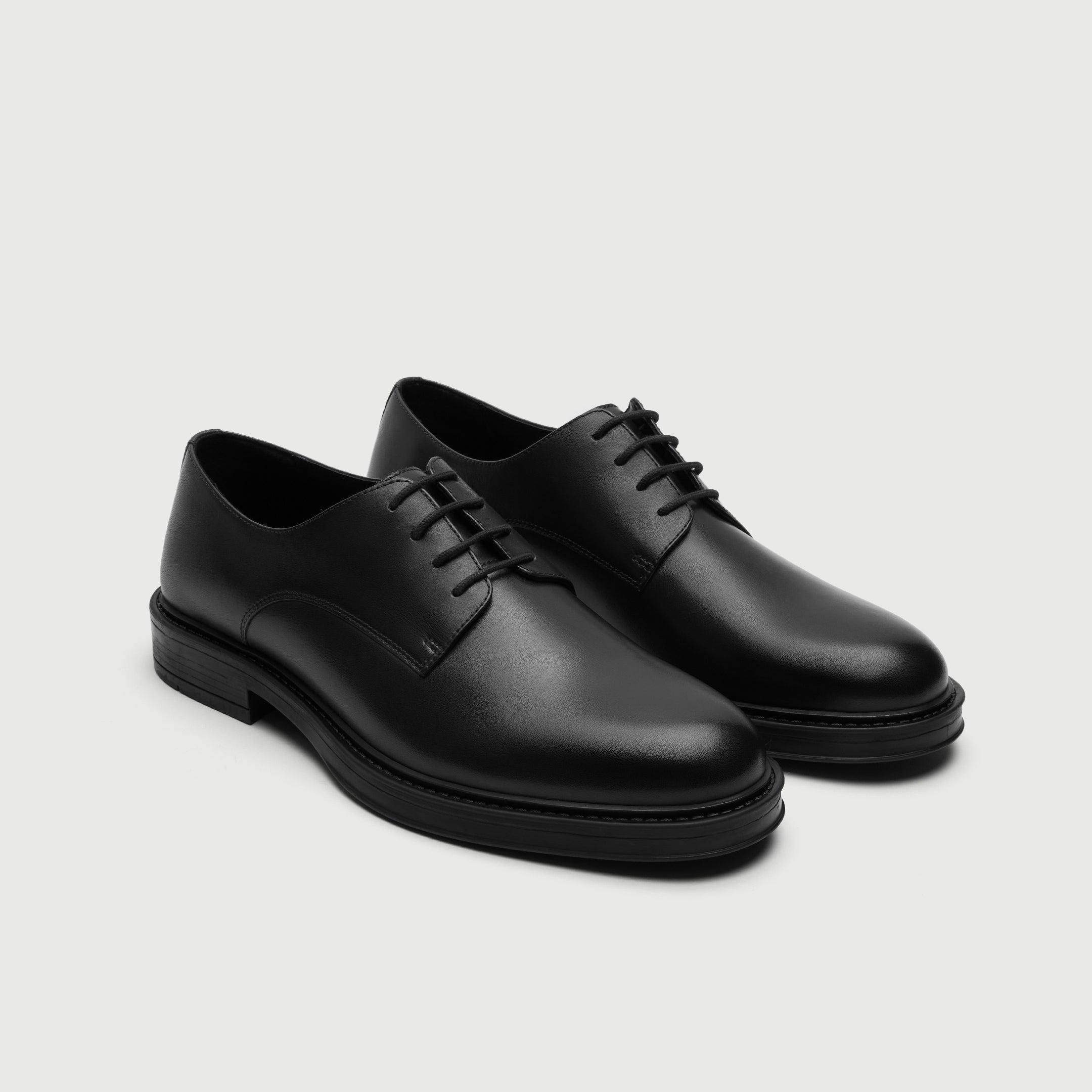 Video of man wearing Walk London Vincent Black Leather Derby Shoes with wide black trousers