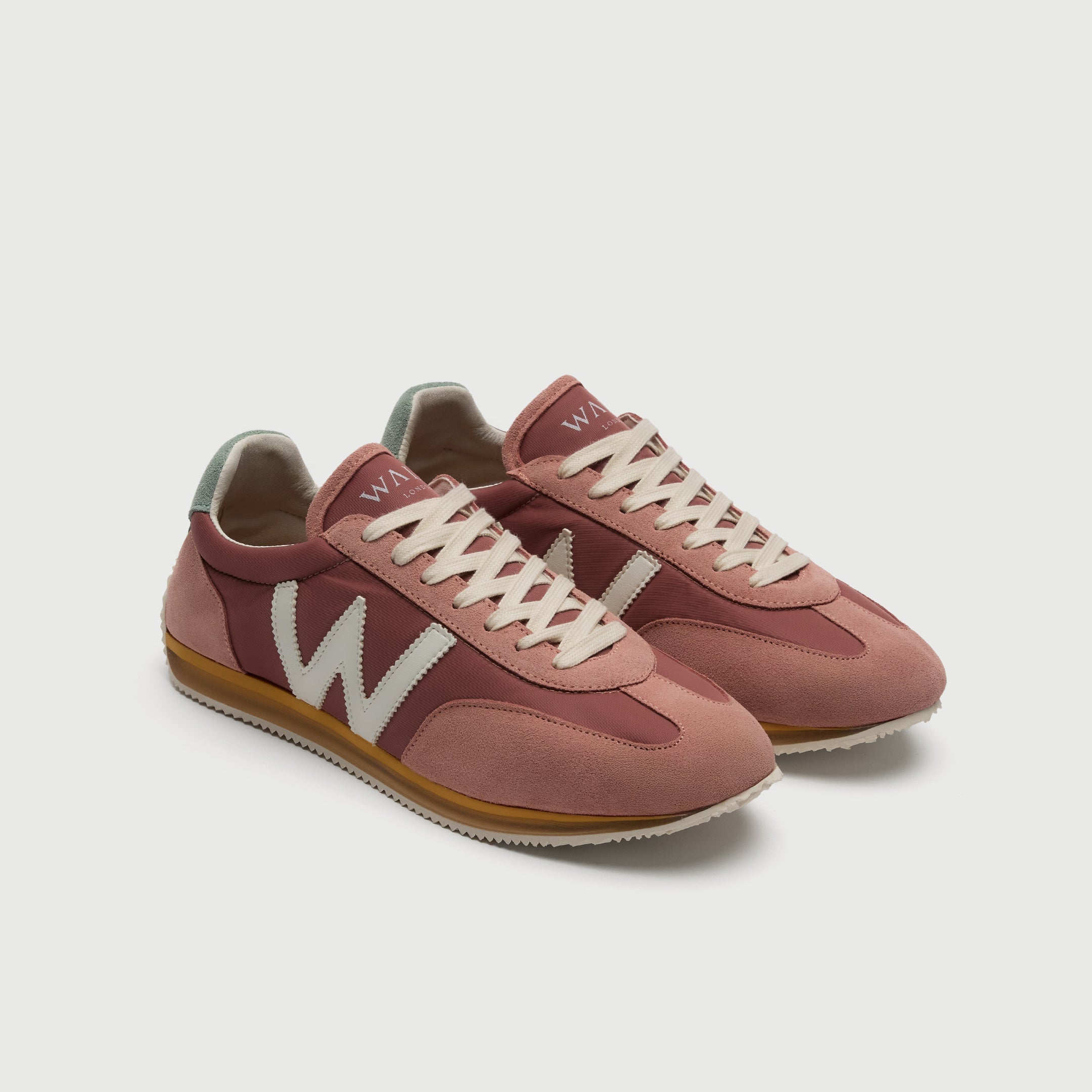 Walk London Retro Runner Mens Trainer in pink suede and textile with white W and laces three quarter view
