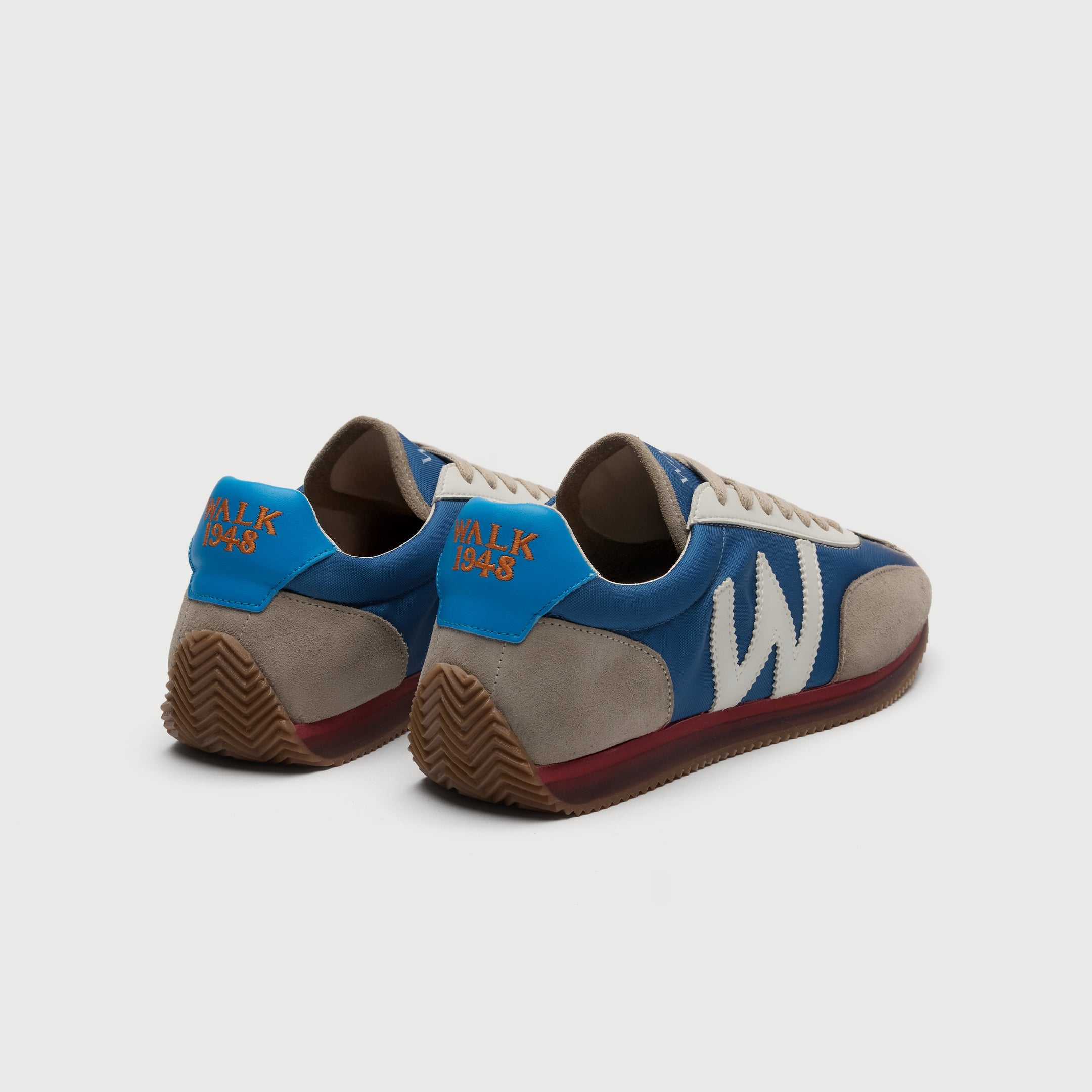 Walk London Retro Runner Trainer in grey suede and blue textile heel view with tan sole and 1948 embroidered on collar
