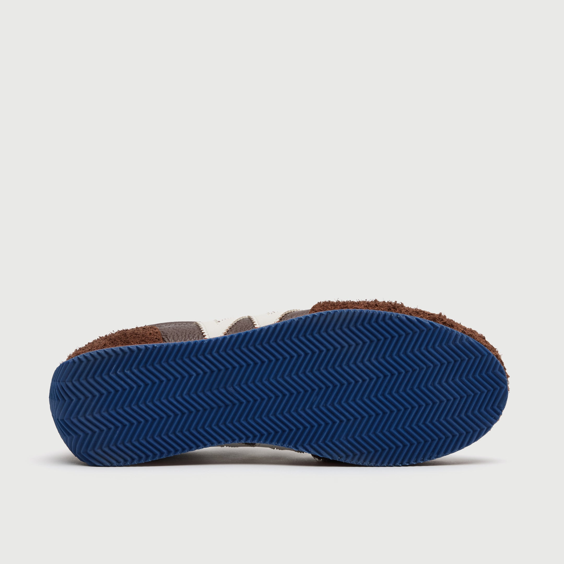 Walk London Retro Runner Trainer in Brown Brushed Suede and Grain Leather sole view showing blue ridged zig-zag sole