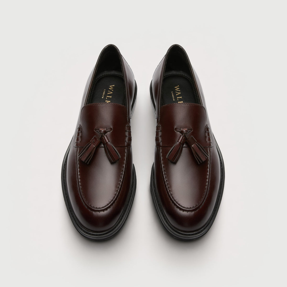 Walk London Richmond Tassel Loafers in Brown Leather top view showing rounded toe shape and gold foil branding on black insoles