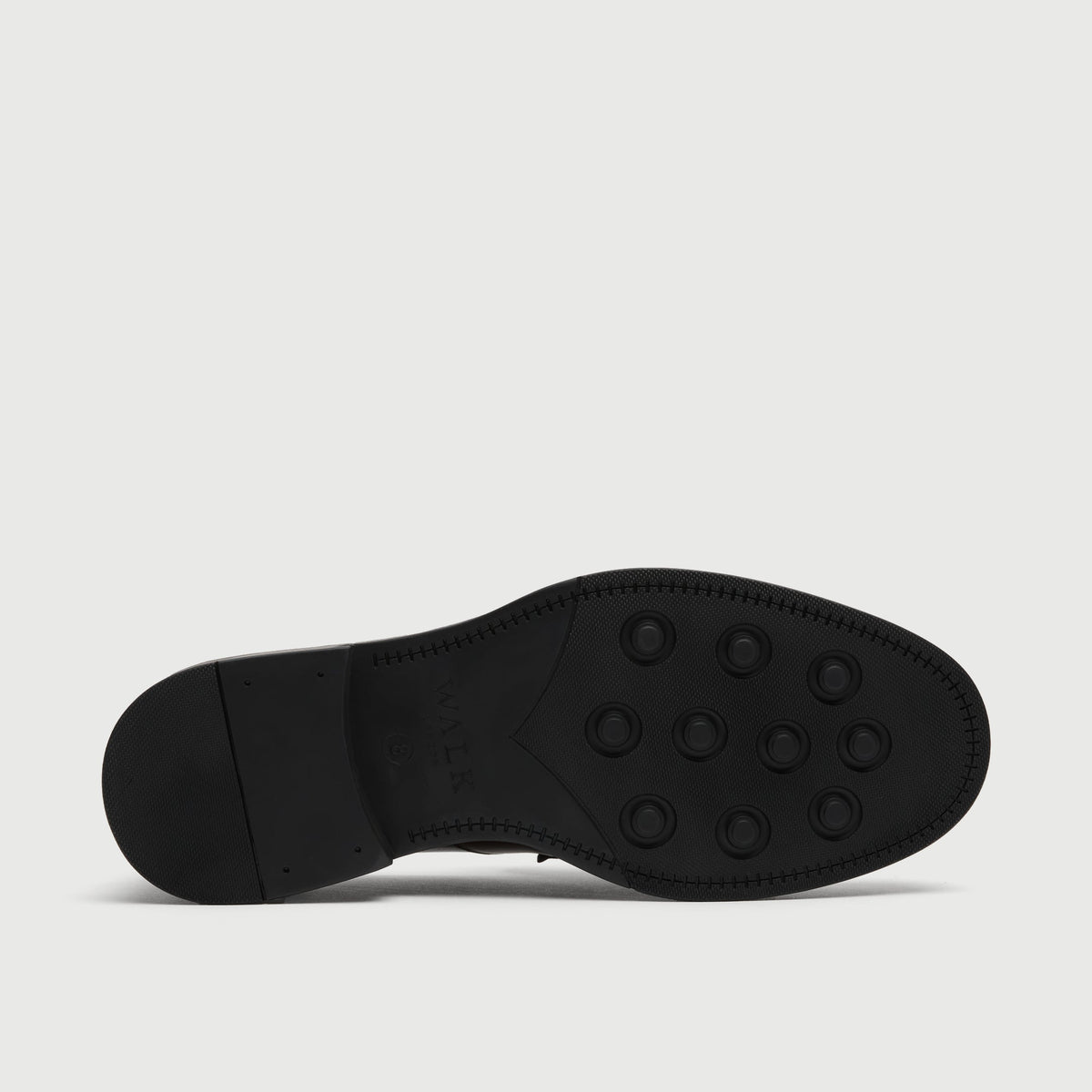Walk London Richmond Tassel Loafer black sole with round recessed lugs and debossed branding