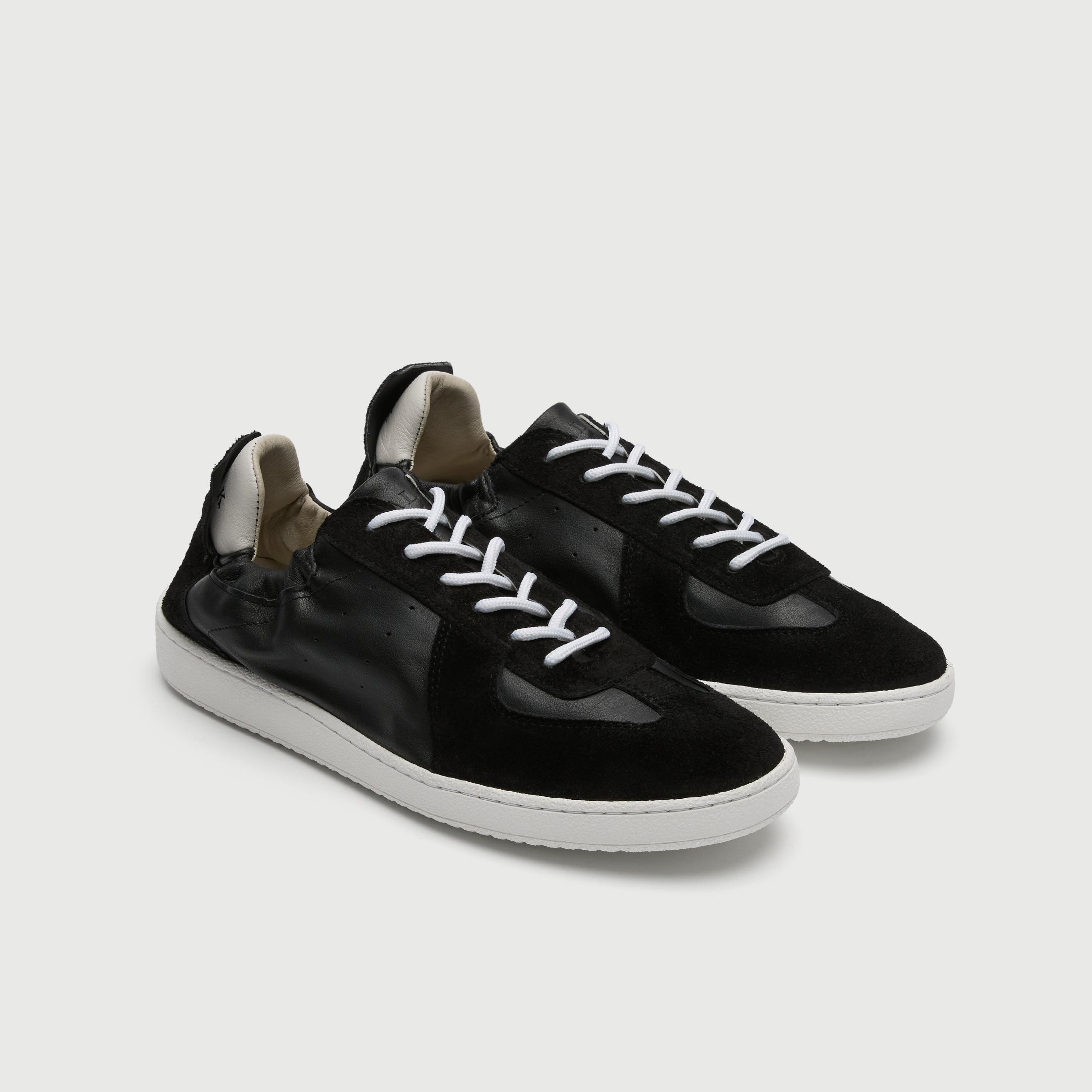 Walk London Rimini Men's Black Suede and Leather Elasticated Trainer three quarter view