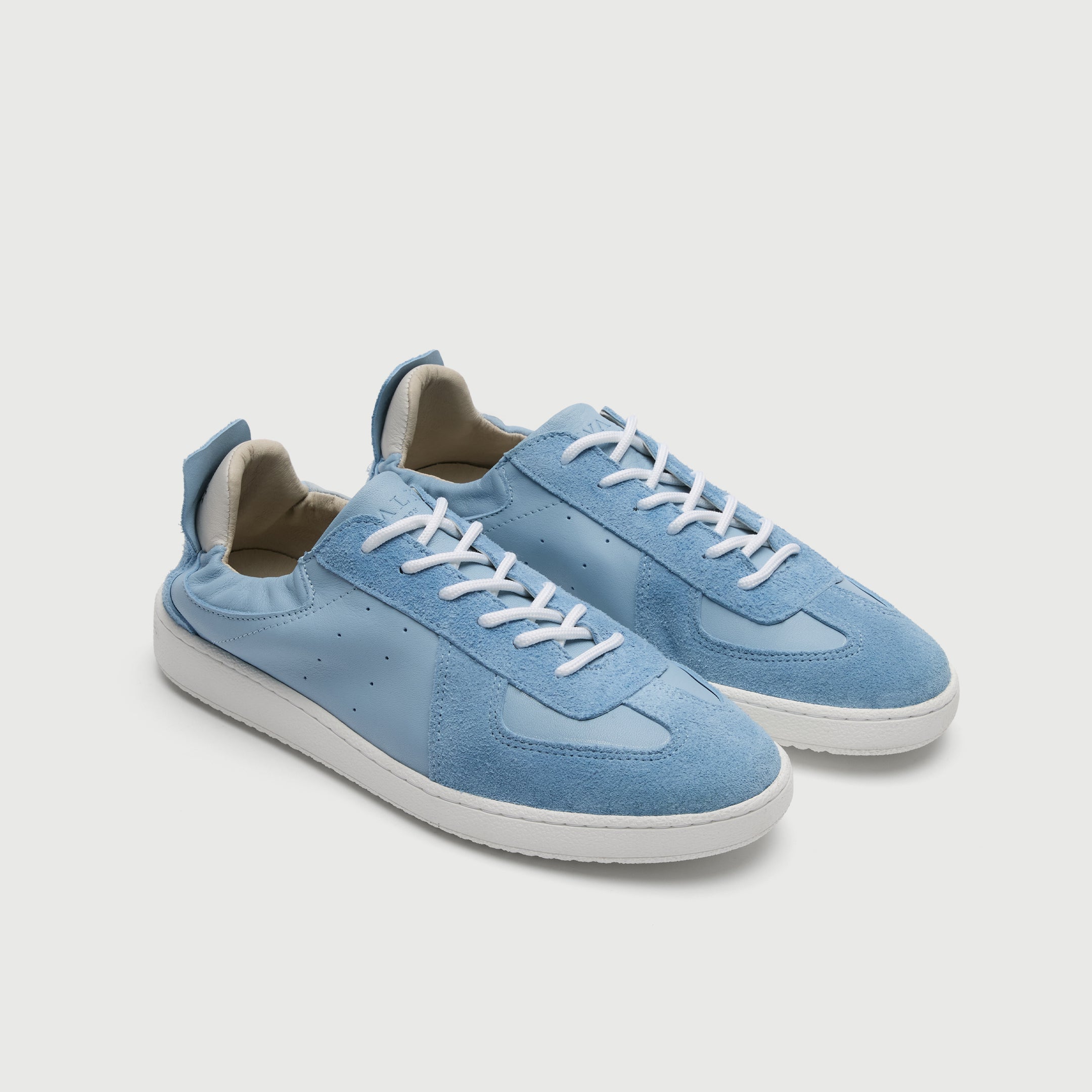 Walk London Rimini Blue Suede Trainers with elastic collar - three quarter view