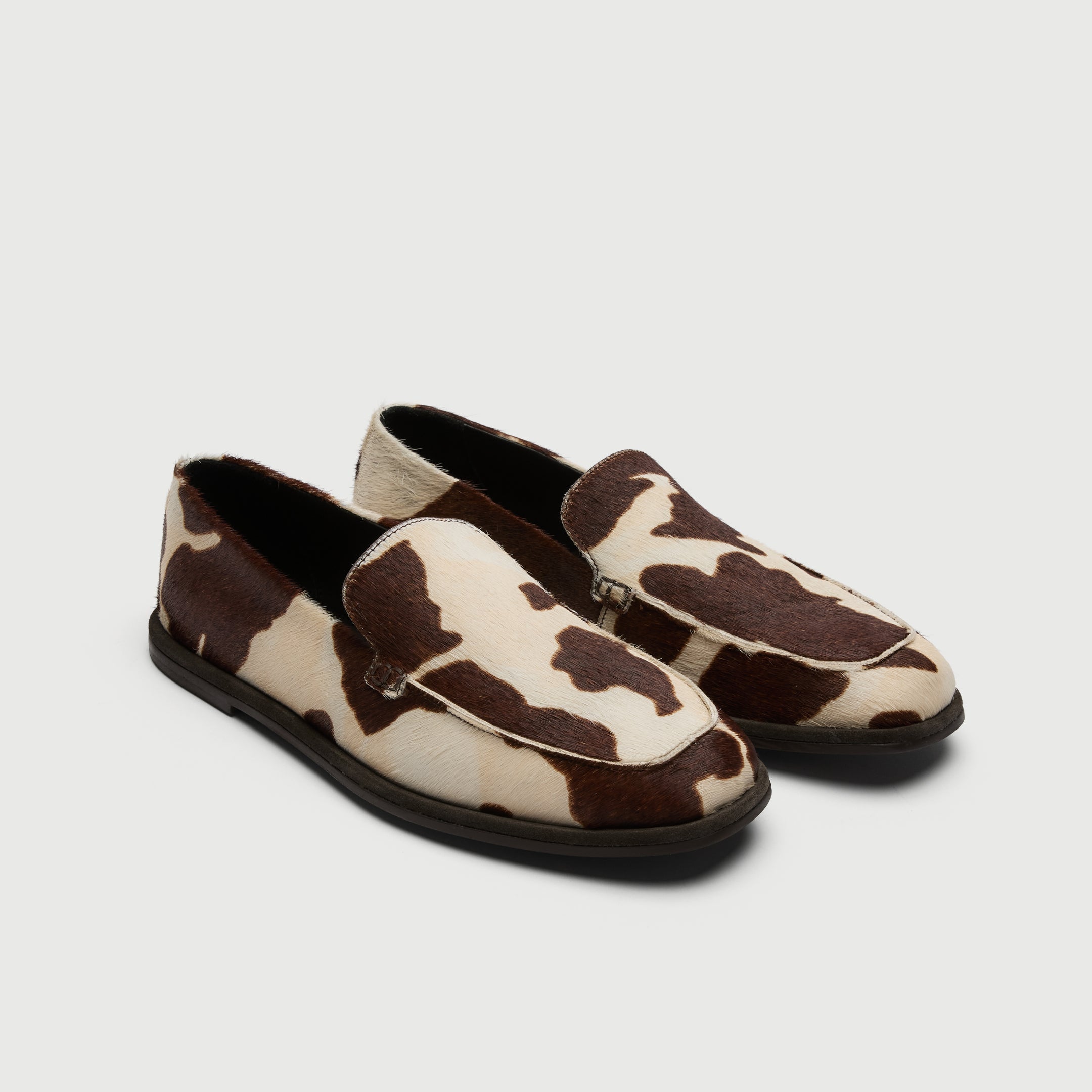 Walk London San Marino Slip On Pony Hair Cow Print Loafer three quarter view