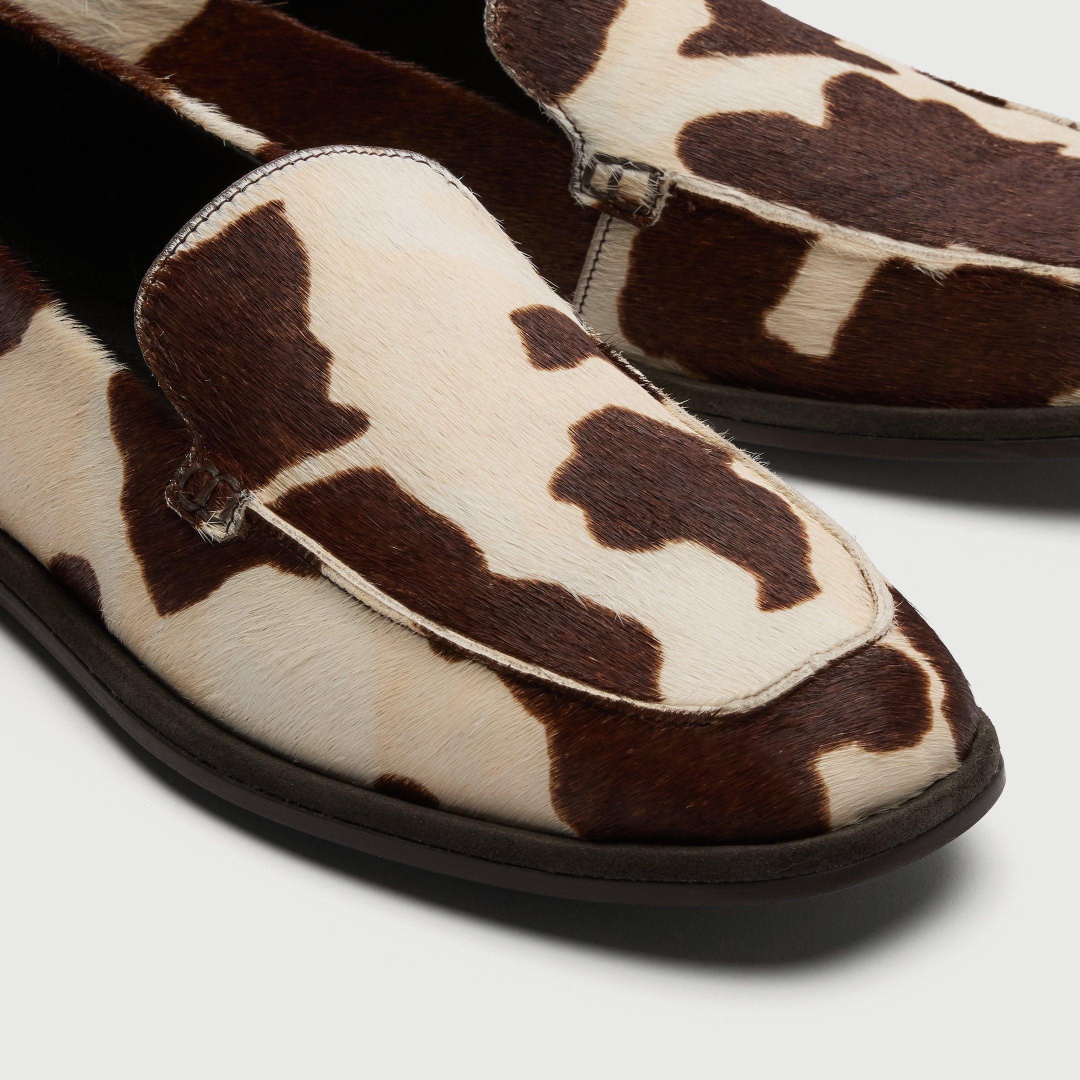 Walk London San Marino Slip On Pony Hair Cow Print Loafer detail view of toe