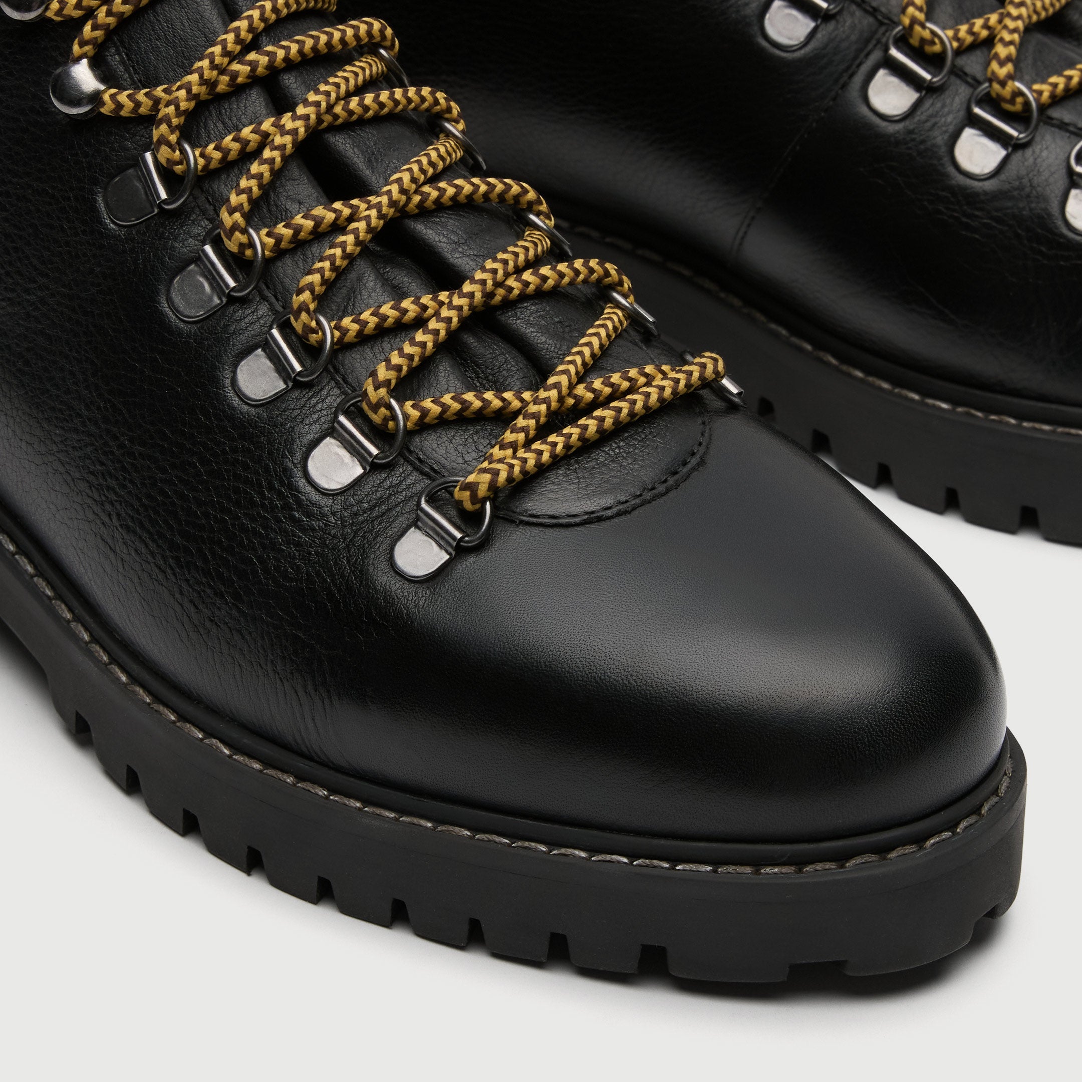 Walk London Sean low hiking boots in black leather and yellow lace