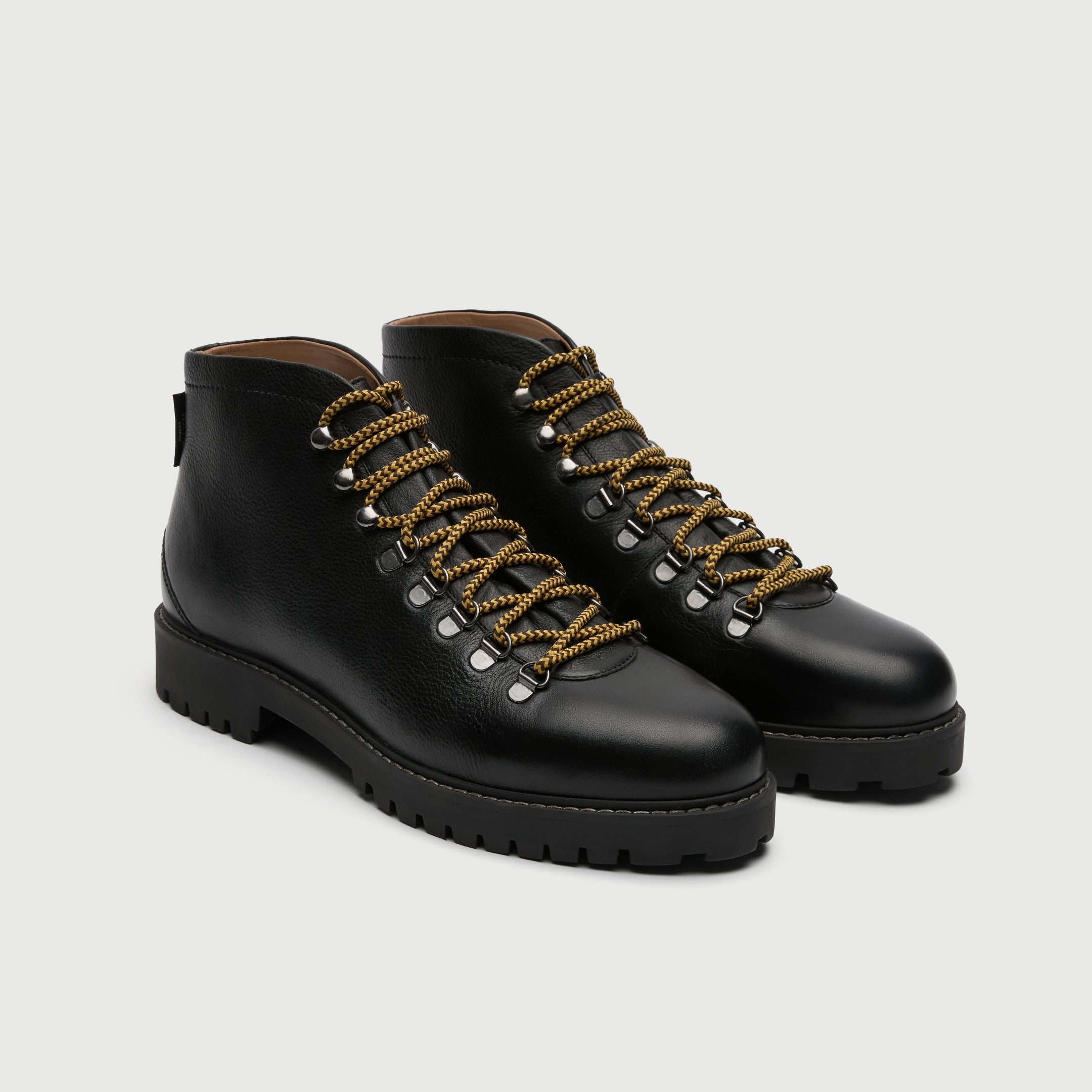 Walk London Sean low hiking boots in black leather and yellow lace
