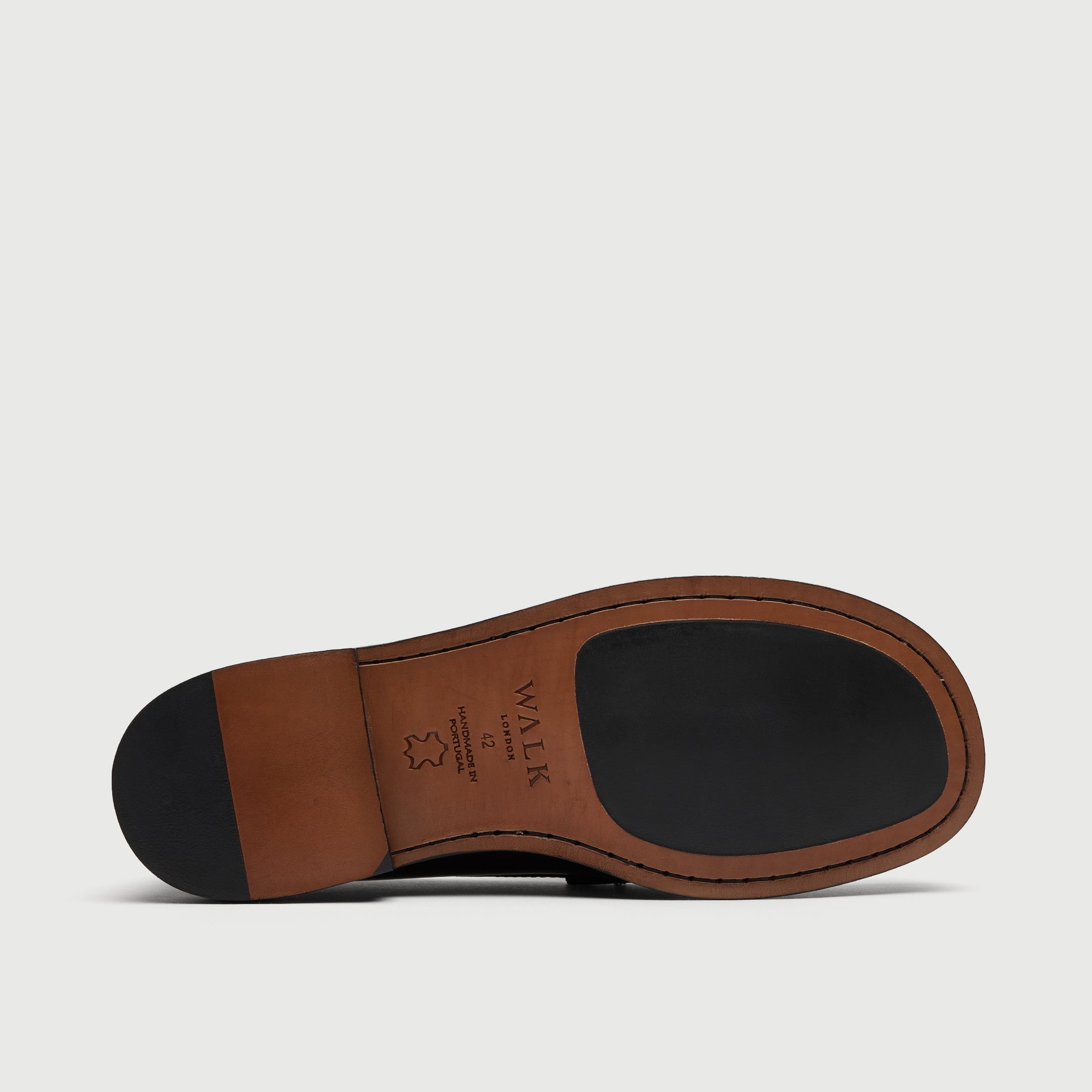 Walk London Shoreditch Penny Loafers in Burgundy Leather sole view showing handmade in Portugal and debossed branding on tan leather sole