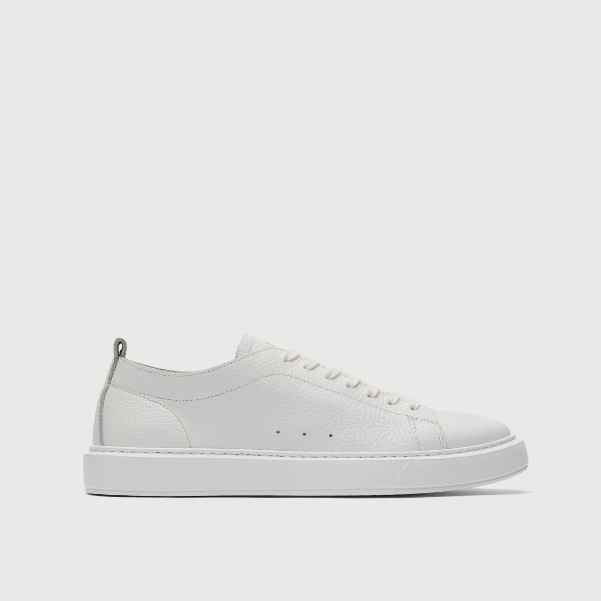 Walk London Wimbledon Trainer in White Grain Leather side view with white sole and vent holes