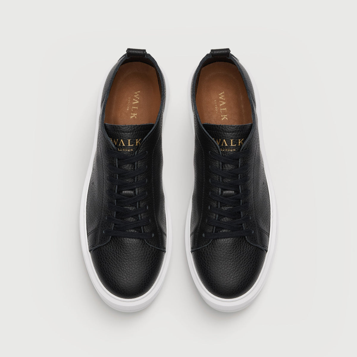 Walk London Wimbledon Trainers in Black Grain Leather top view showing gold foil branding on tongue, tan insole with gold foil branding