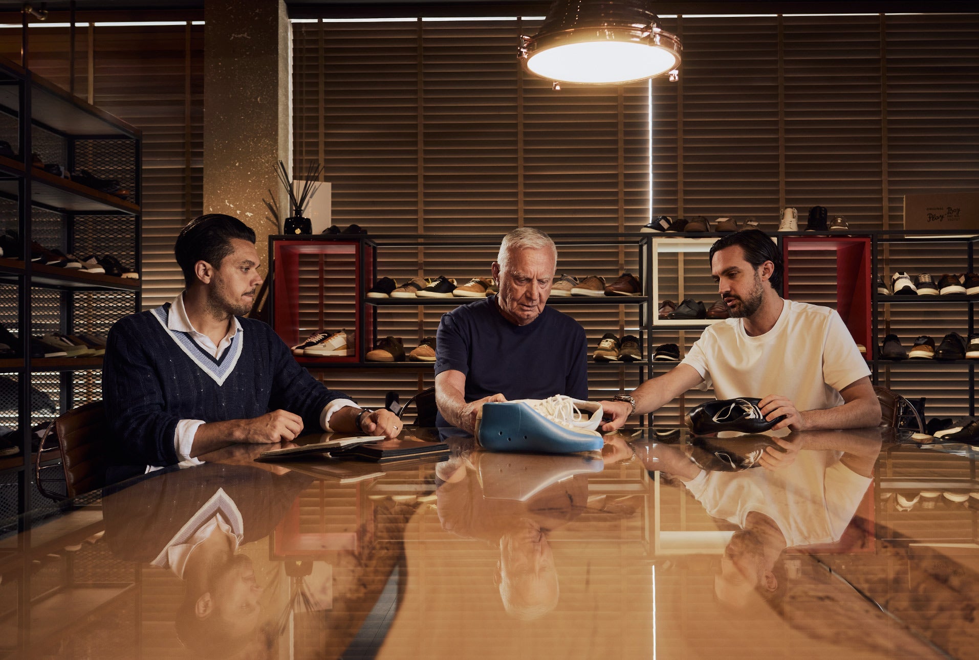 Walk London designers reviewing footwear around a table