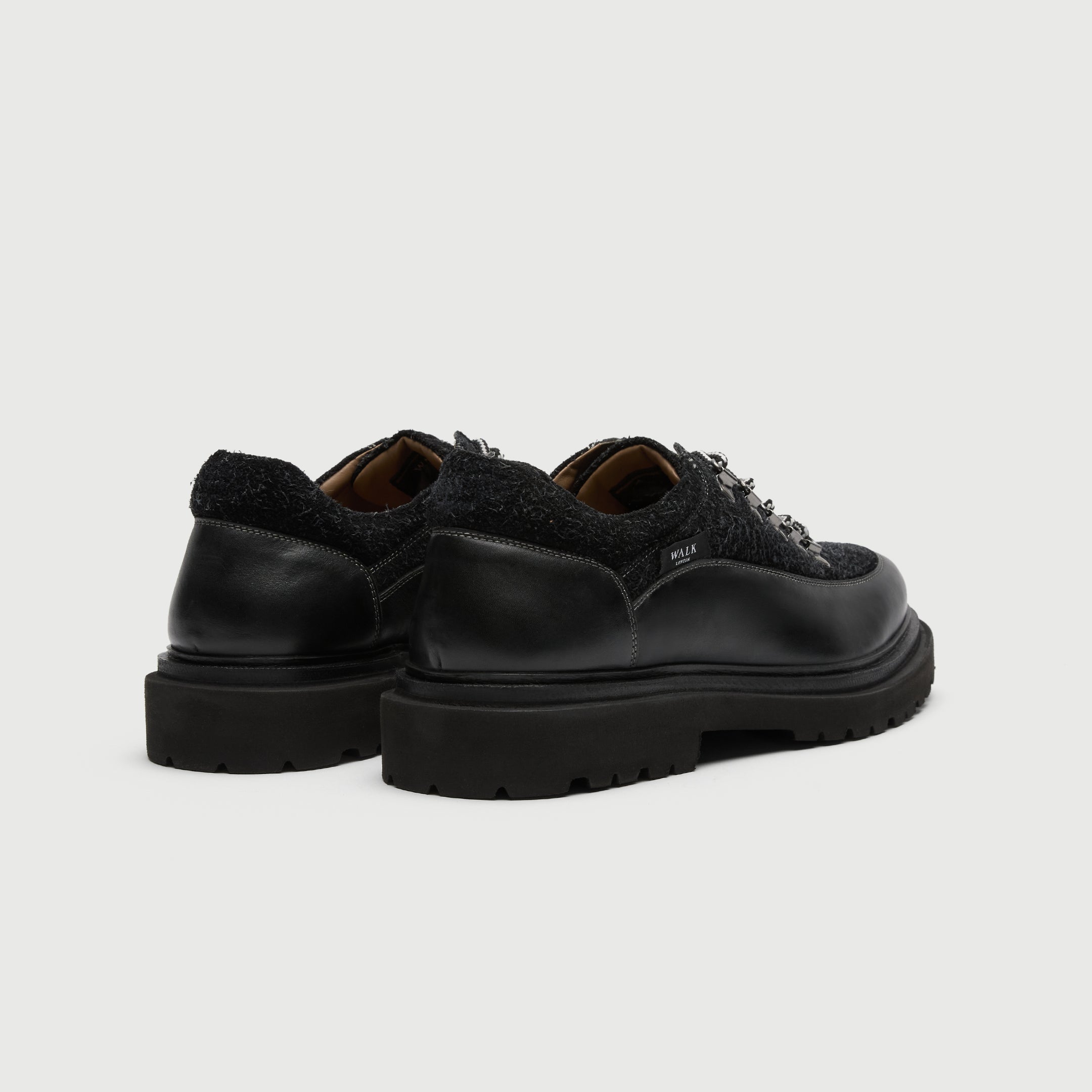 Walk London Bethnal Hiking Shoes in black leather and hairy suede heel view with padded collar