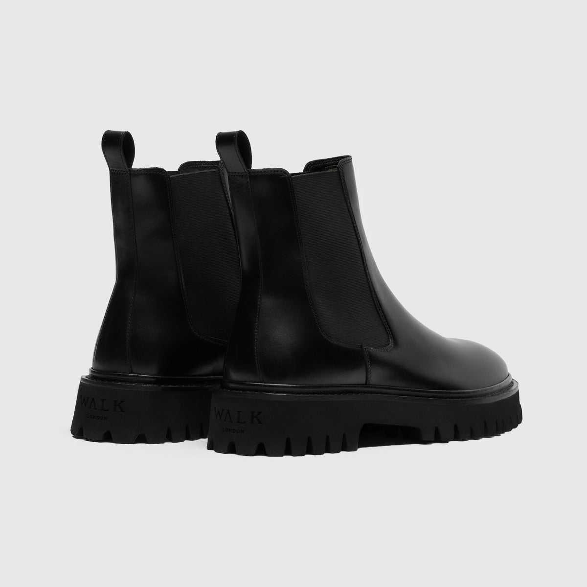 Walk London Hopper Black Leather Chelsea Boots heel view with pull tab and debossed branding on heel 