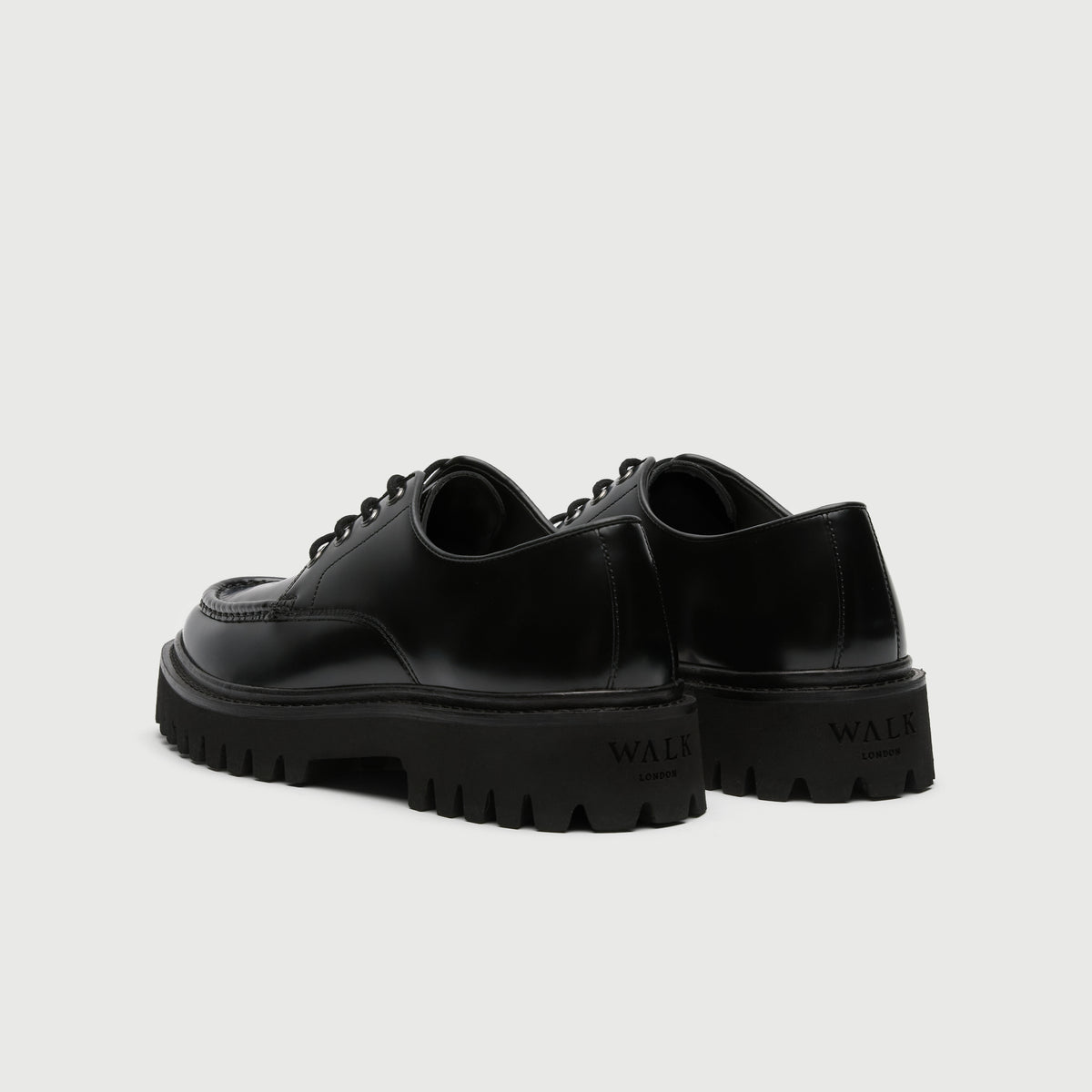 Walk London Hopper Black Smooth Leather Lace Shoe with chunky sole heel view showing debossed branding