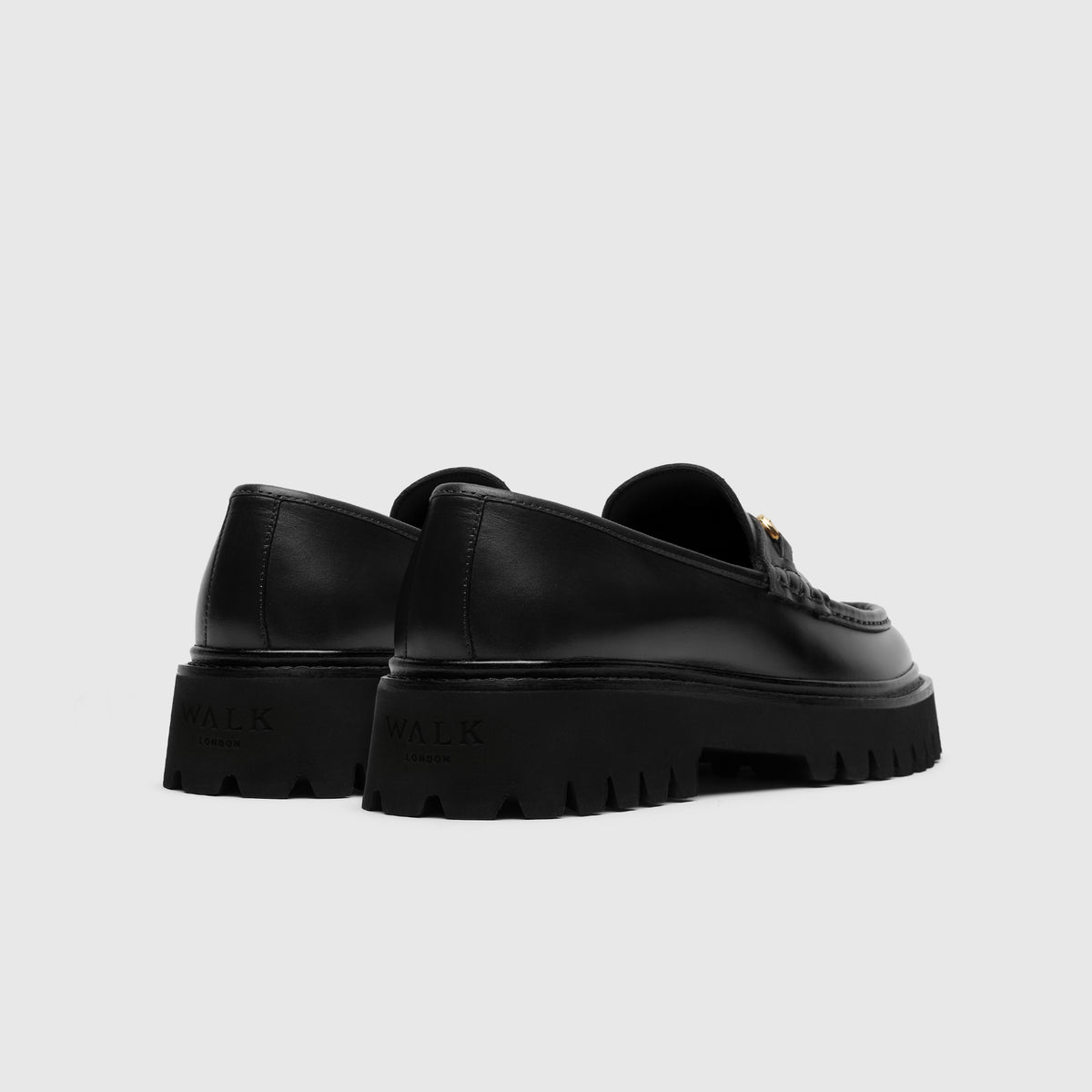 Walk London Hopper Black Leather Trim Loafers with chunky sole heel view showing debossed branding