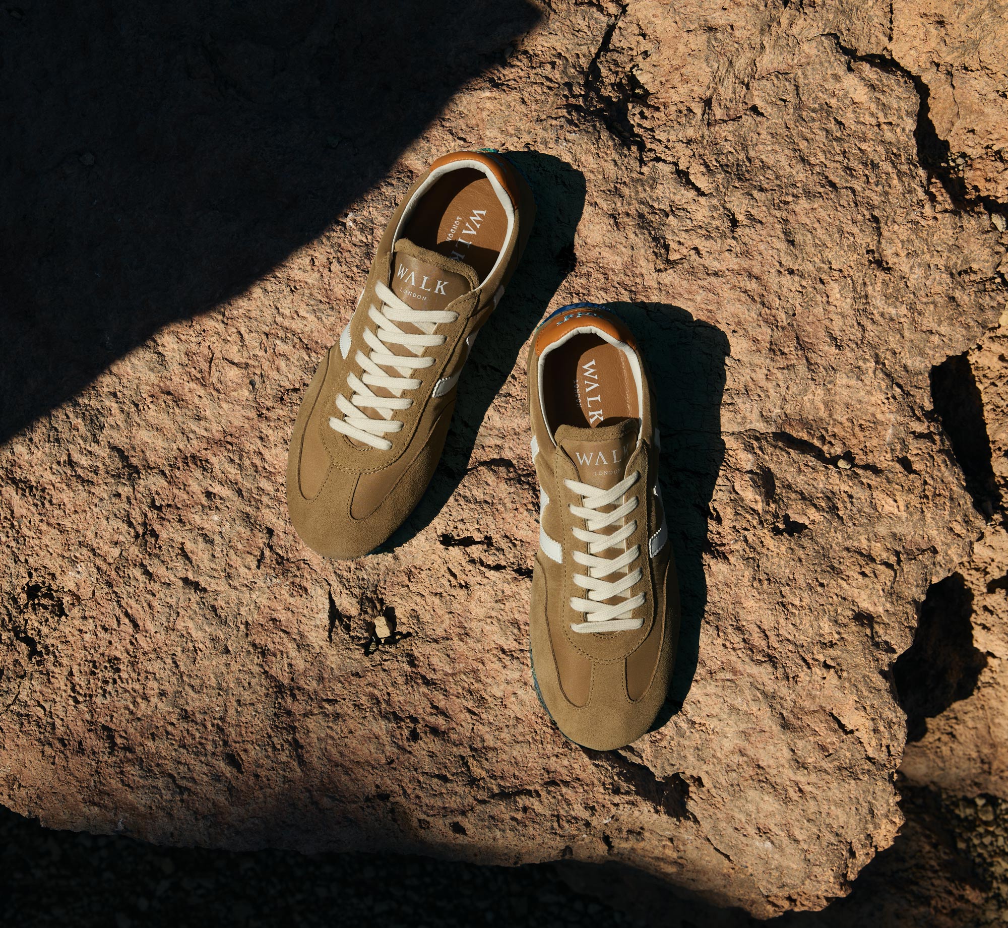Stone suede Retro Runner Trainers on volcanic rock