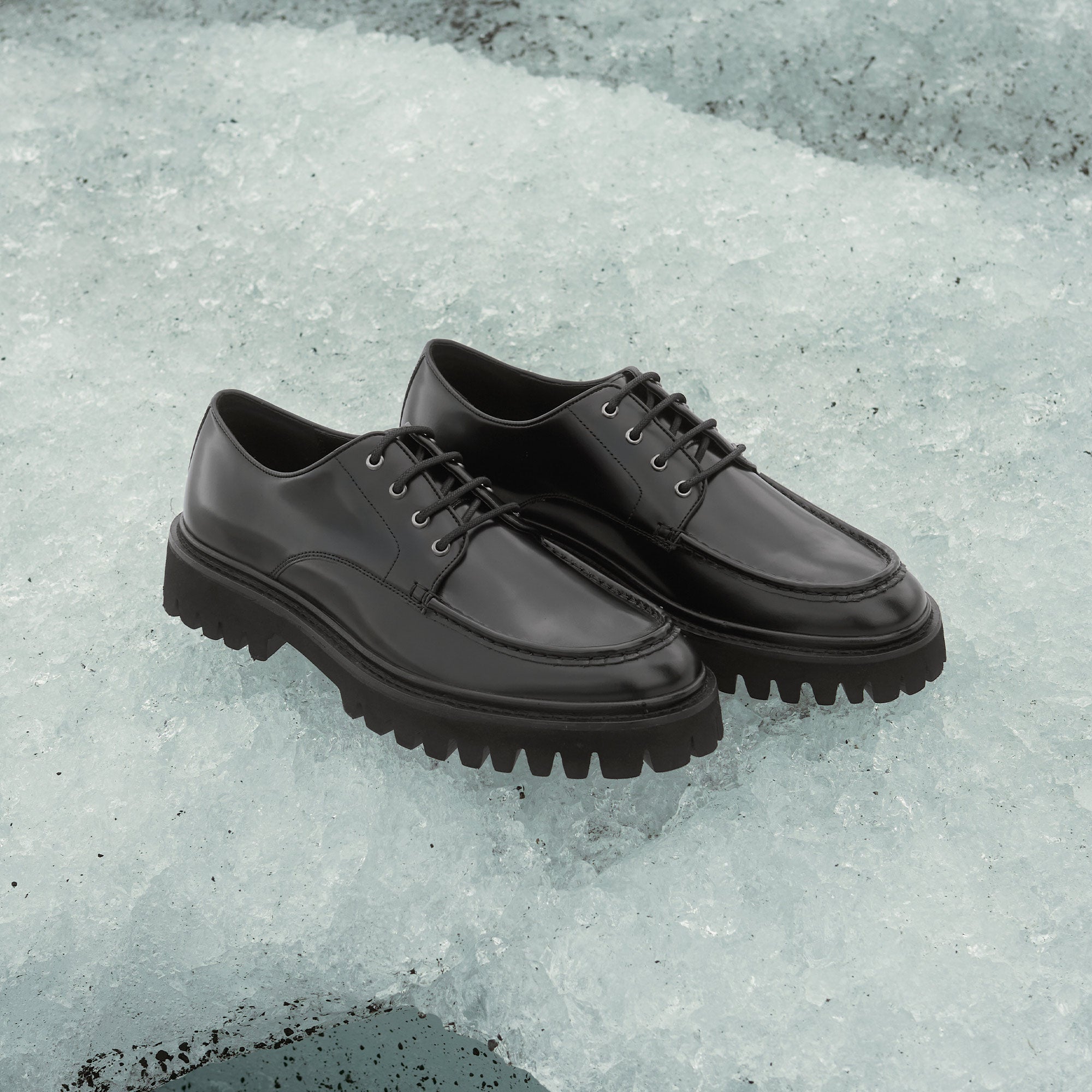 hopper lace black leather shoes on ice glacier 