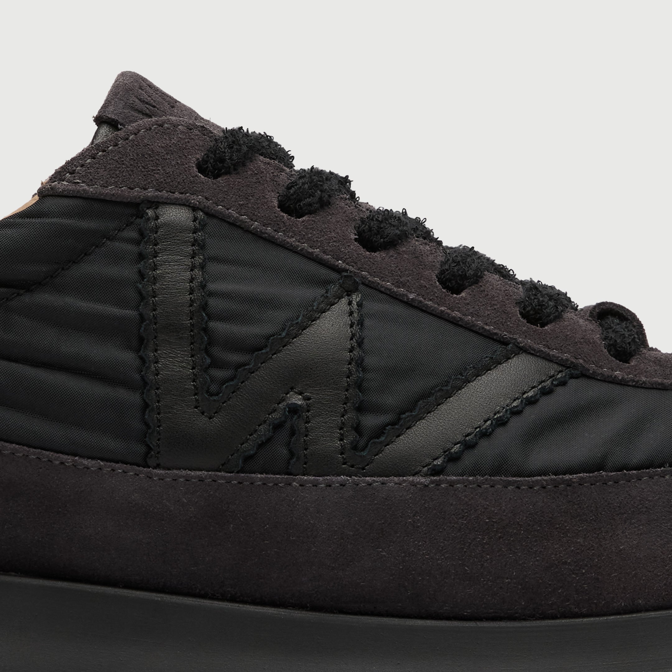 Walk London Chiswick Lace Trainer in black textile and grey suede close up view of hairy laces and W panel