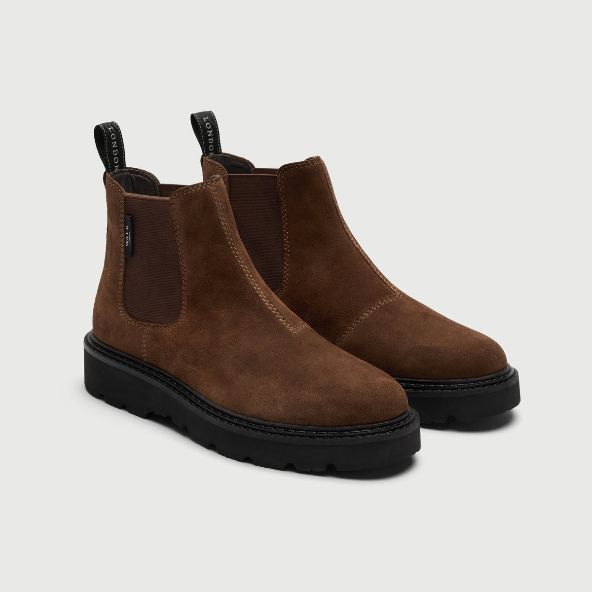 Walk London Clapham Chelsea Boots in tan suede three quarter view showing seam stitch detail and pull tabs